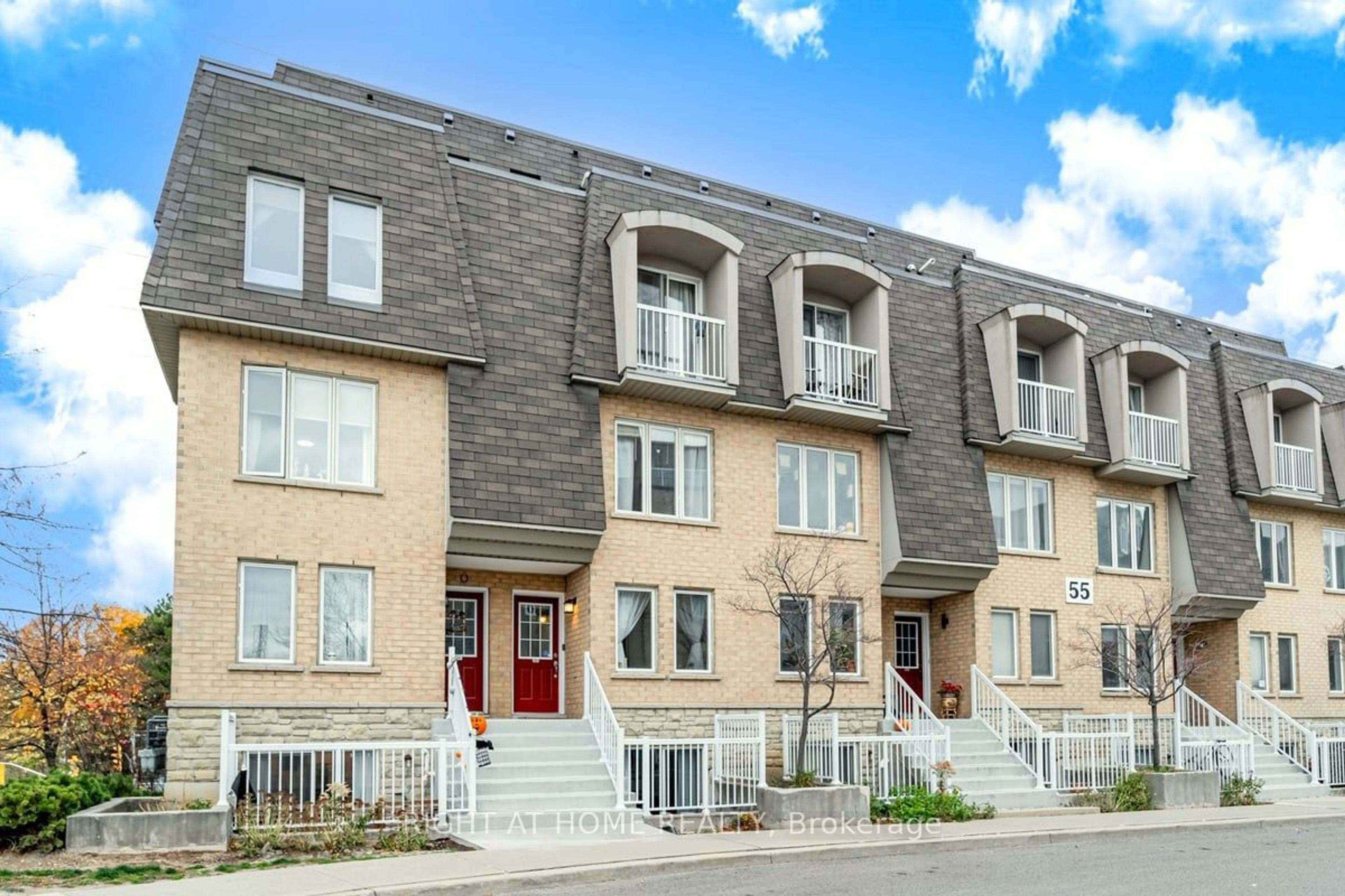 A pic from exterior of the house or condo, the street view for 55 Turntable Cres #77, Toronto Ontario M6H 4K8