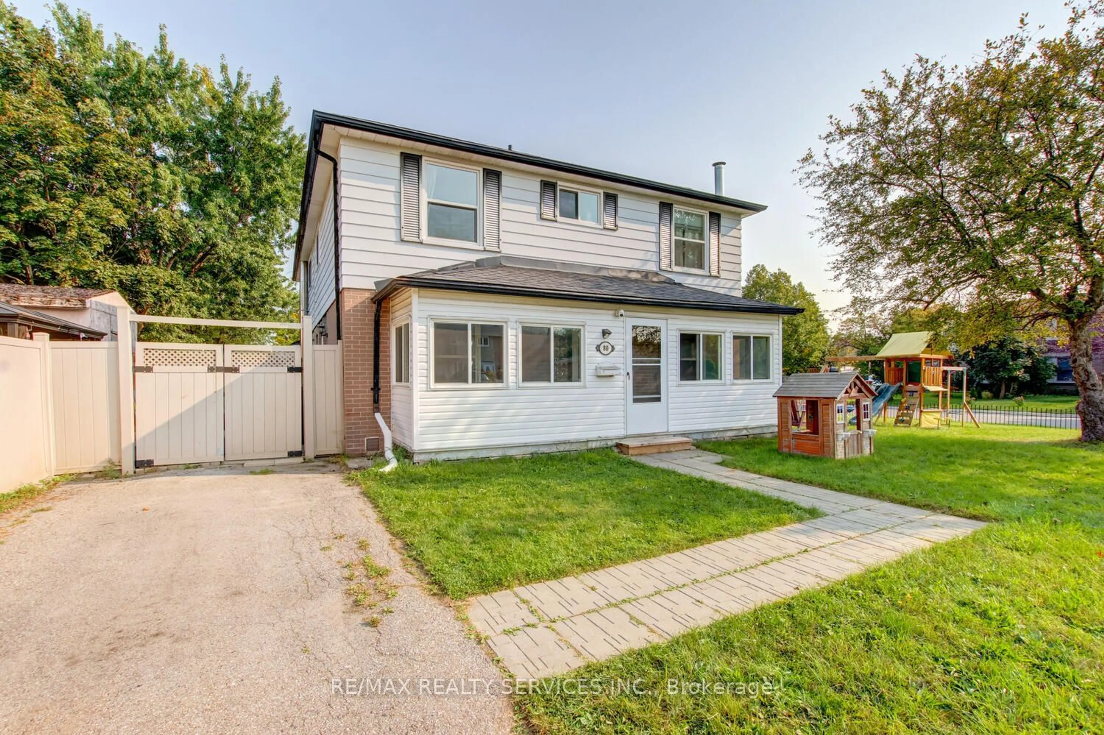 Frontside or backside of a home, the fenced backyard for 80 Flamingo Cres, Brampton Ontario L6T 2G7