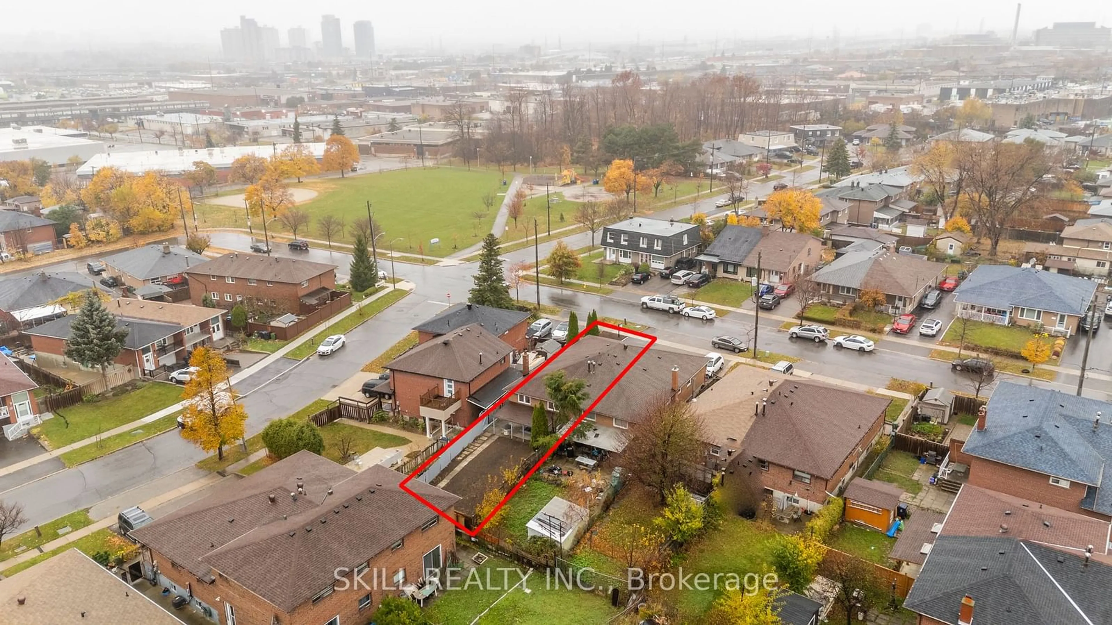 A pic from exterior of the house or condo, the fenced backyard for 65 Frith Rd, Toronto Ontario M3N 1G4