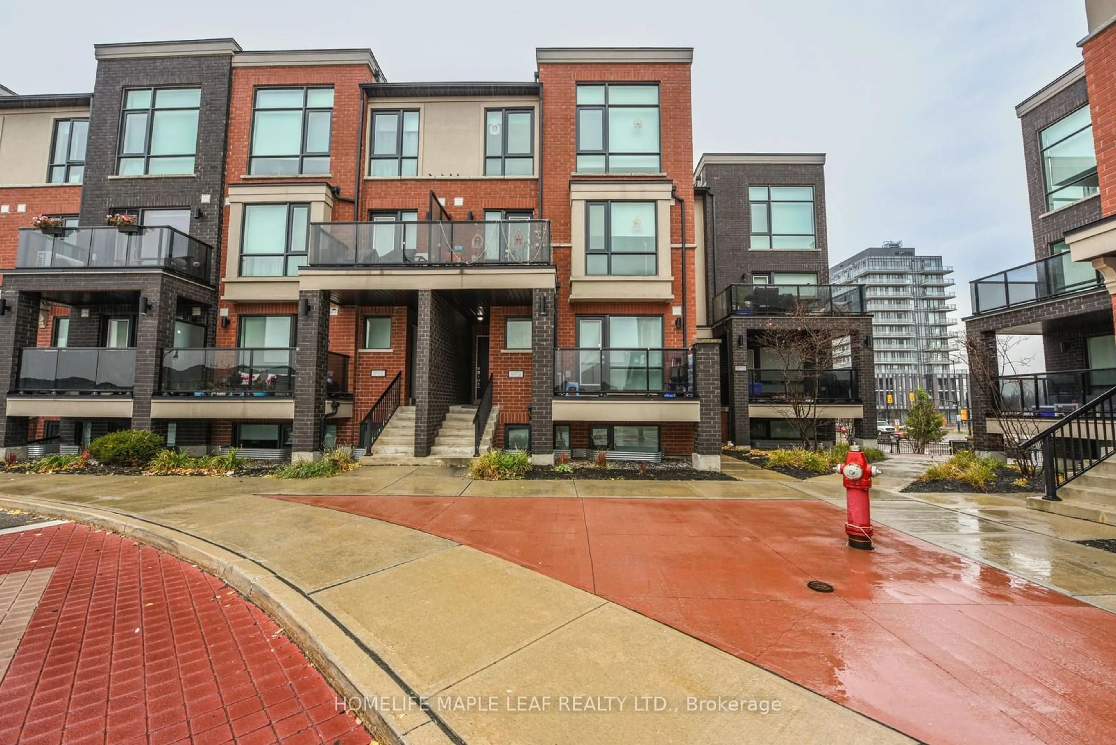 A pic from exterior of the house or condo, the street view for 100 Dufay Rd #98, Brampton Ontario L7A 4S3