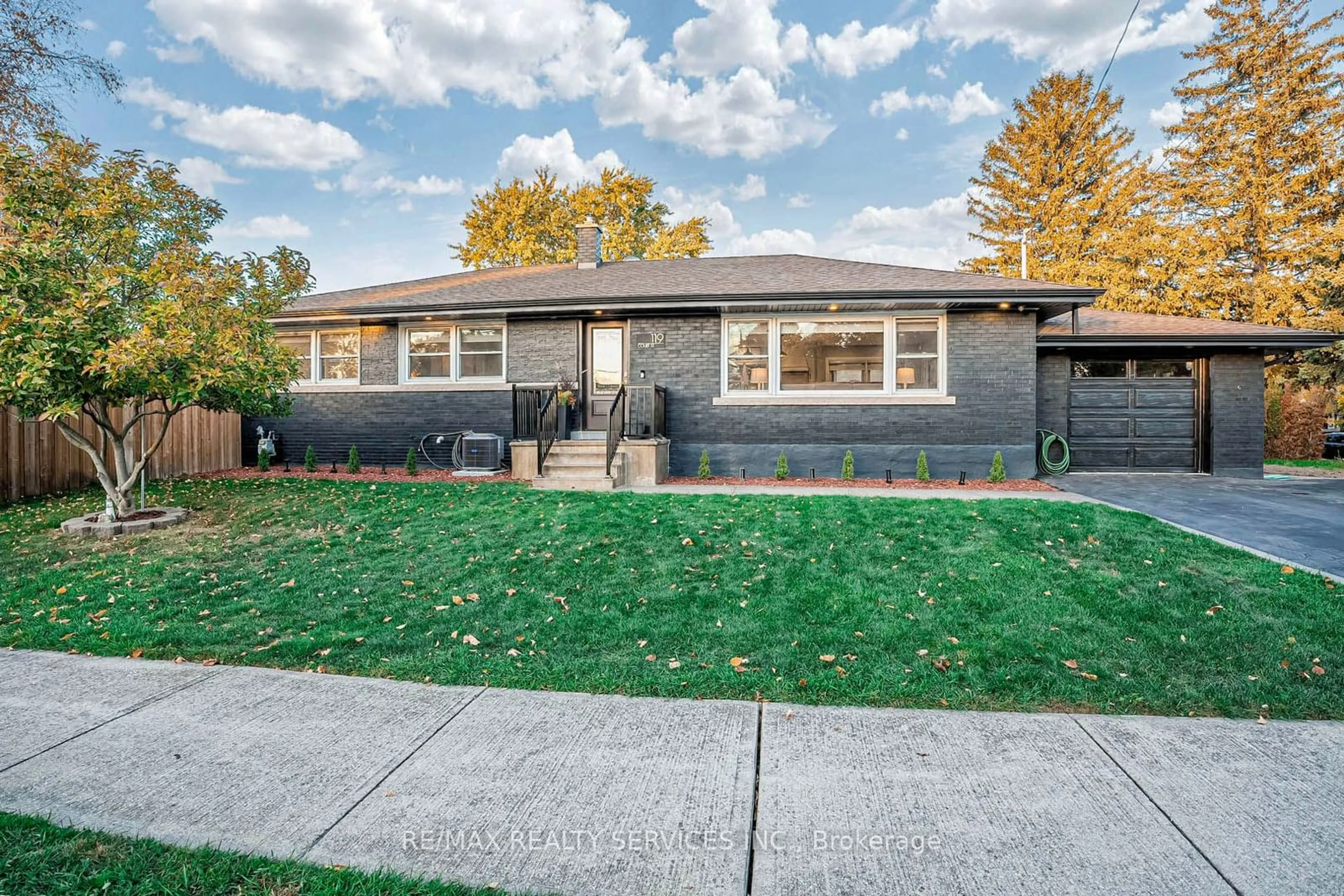 A pic from exterior of the house or condo, the fenced backyard for 119 Court St, Milton Ontario L9T 2S5