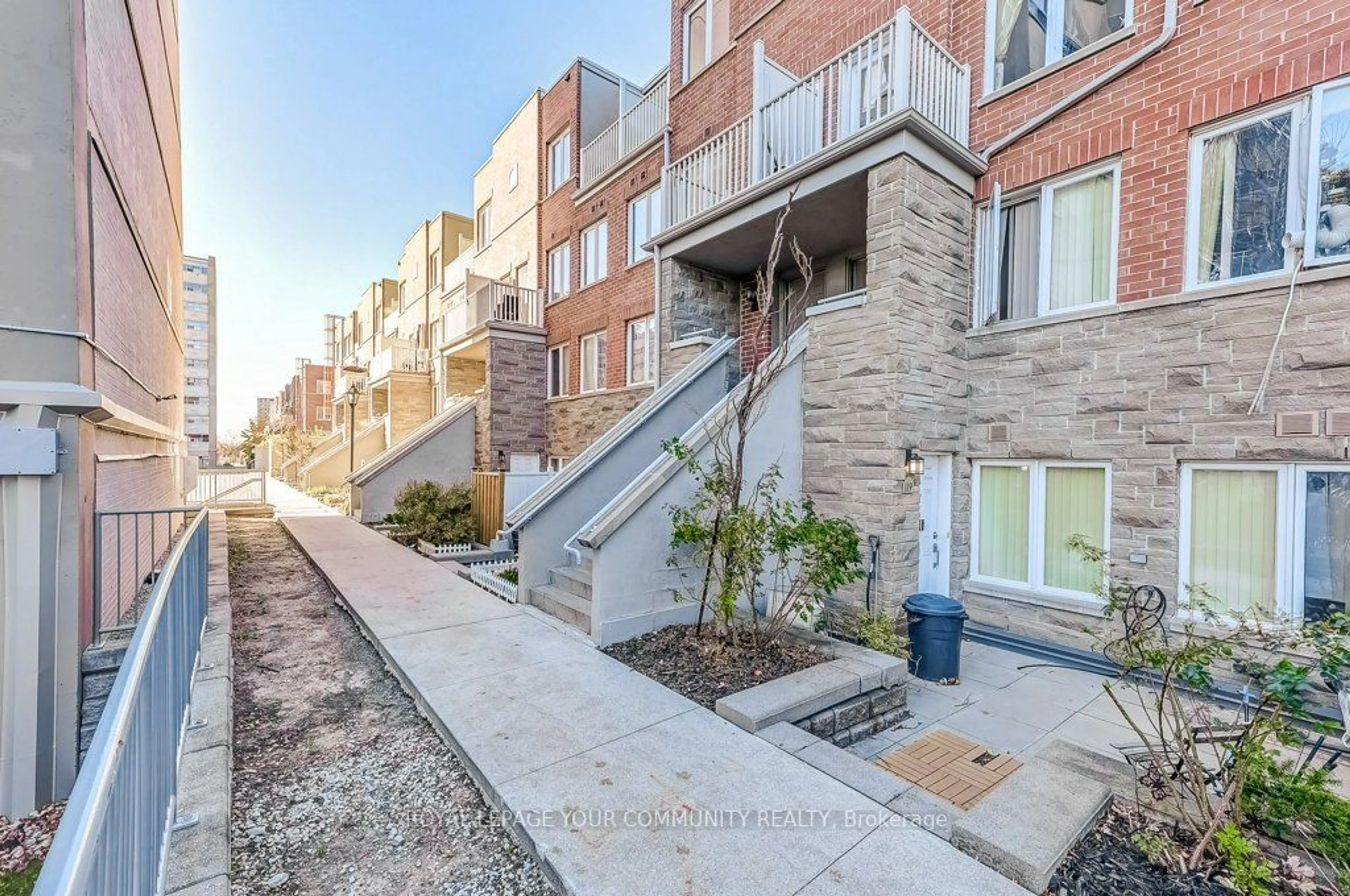 A pic from exterior of the house or condo, the street view for 5 Richgrove Dr #218, Toronto Ontario M9R 0A3