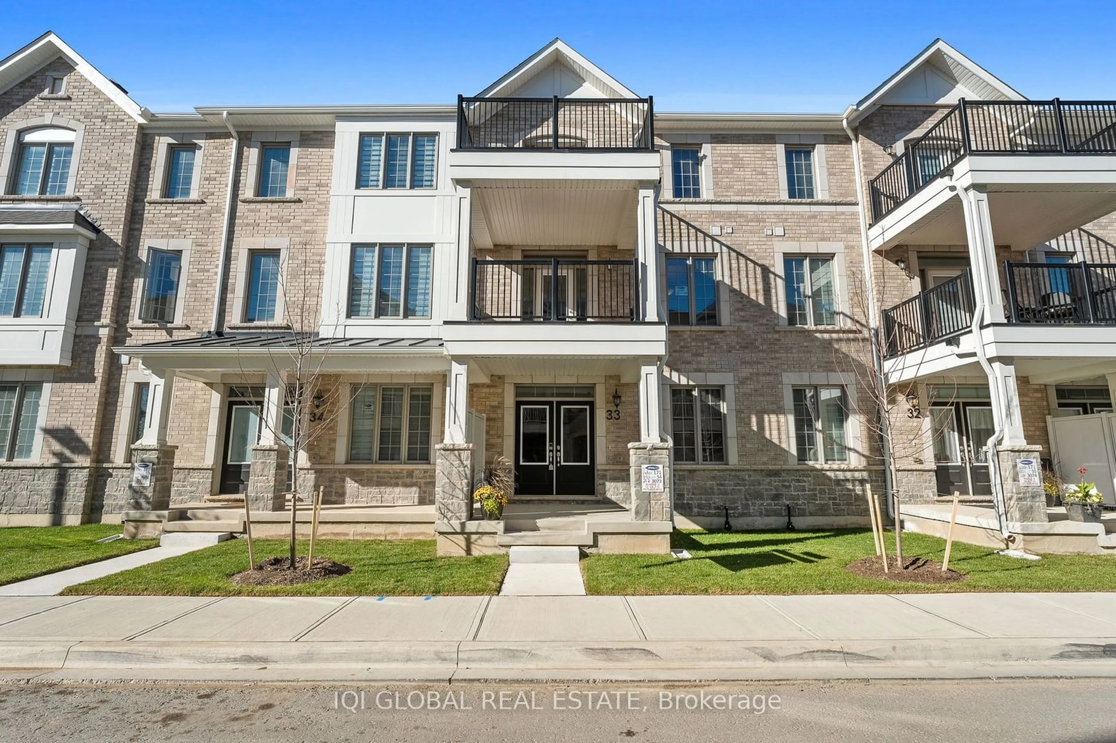 A pic from exterior of the house or condo, the street view for 1317 Leriche Way #33, Milton Ontario L9E 0H5