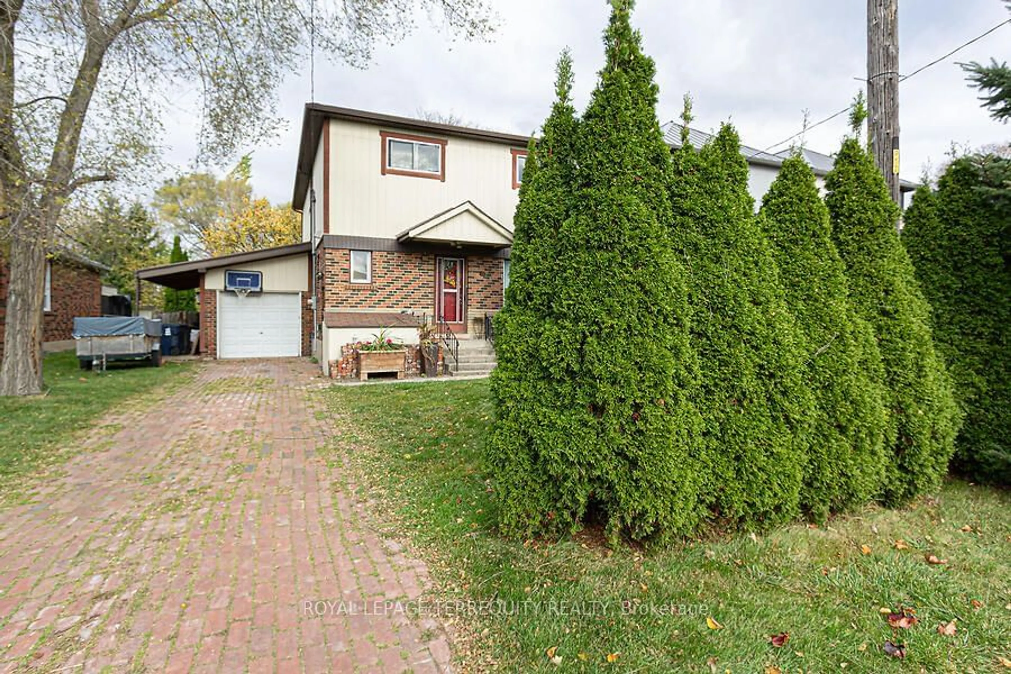 Frontside or backside of a home, cottage for 12 Chauncey Ave, Toronto Ontario M8Z 2Z3