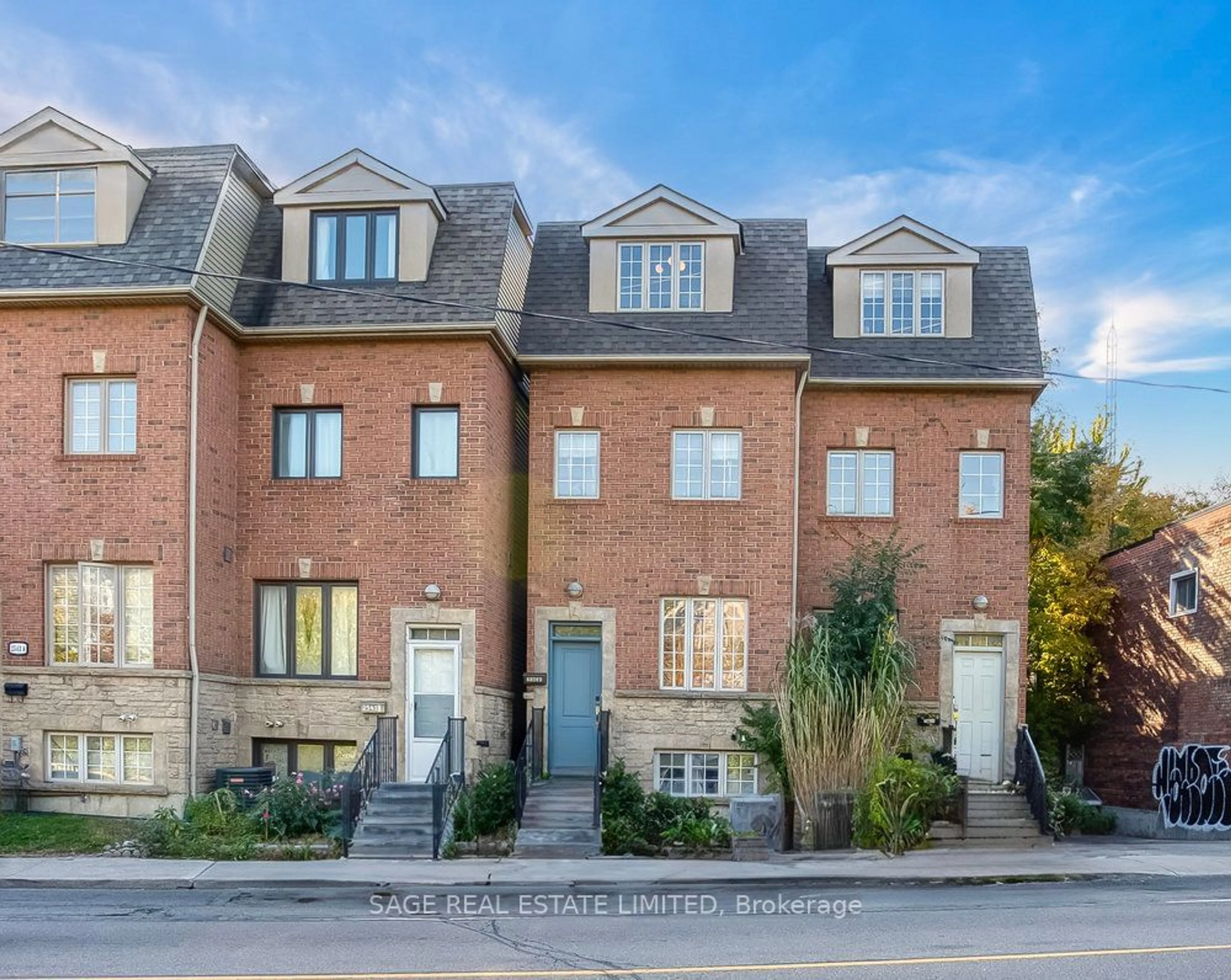 A pic from exterior of the house or condo, the street view for 2543A Dundas St, Toronto Ontario M6P 1X6