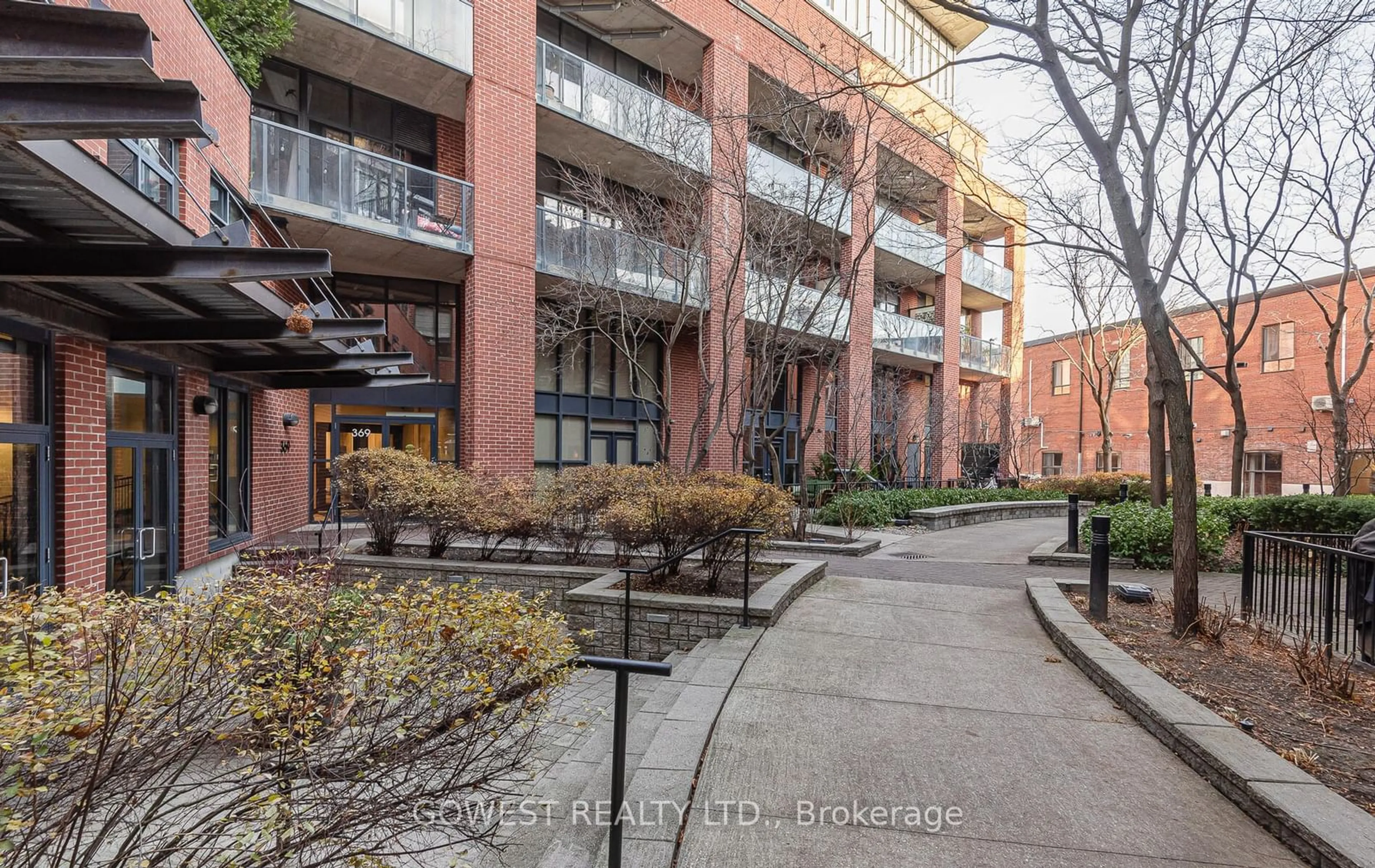 A pic from exterior of the house or condo, the front or back of building for 369 Sorauren Ave #201, Toronto Ontario M6R 3C1