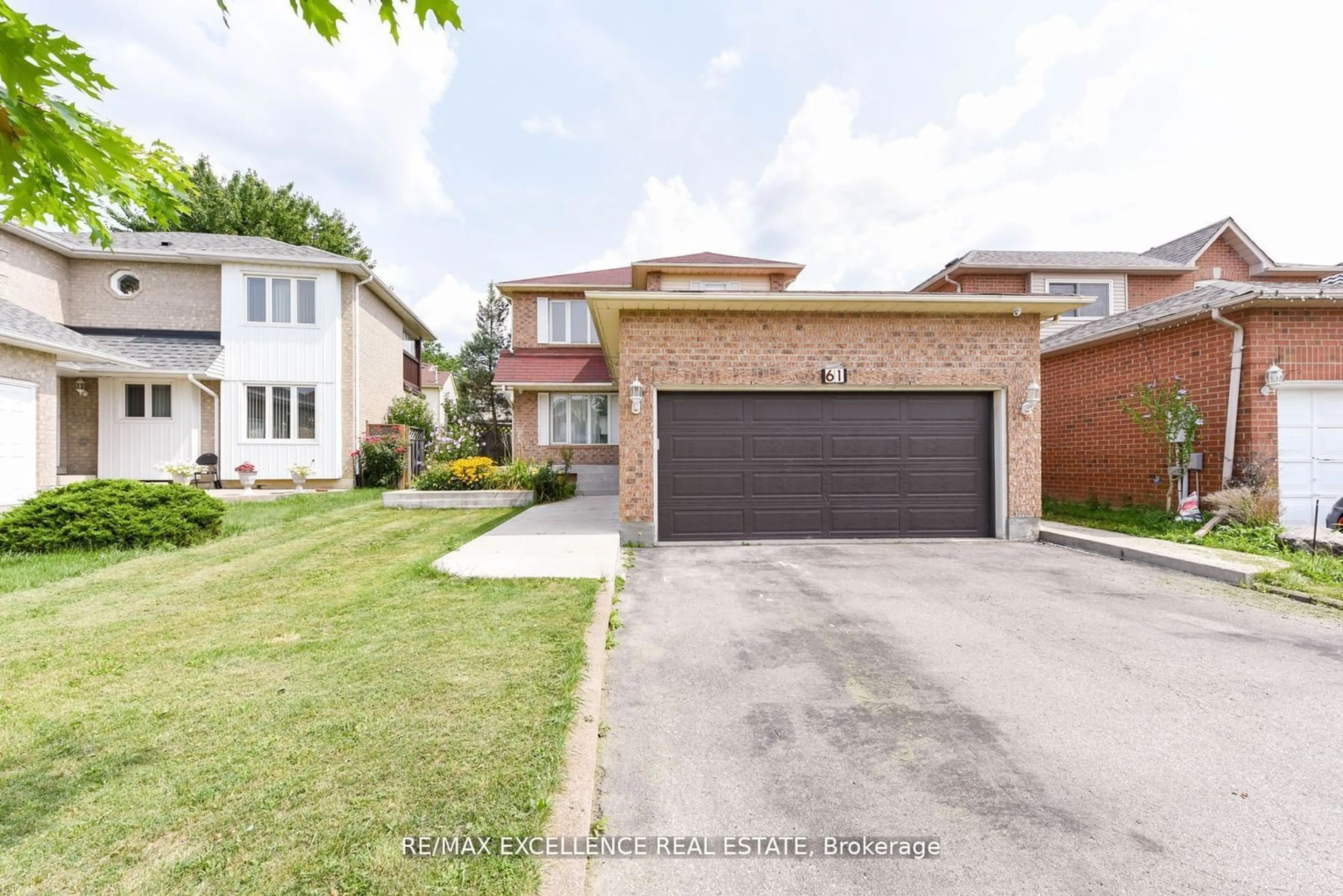 Frontside or backside of a home, the street view for 61 Drinkwater Rd, Brampton Ontario L6Y 4T8