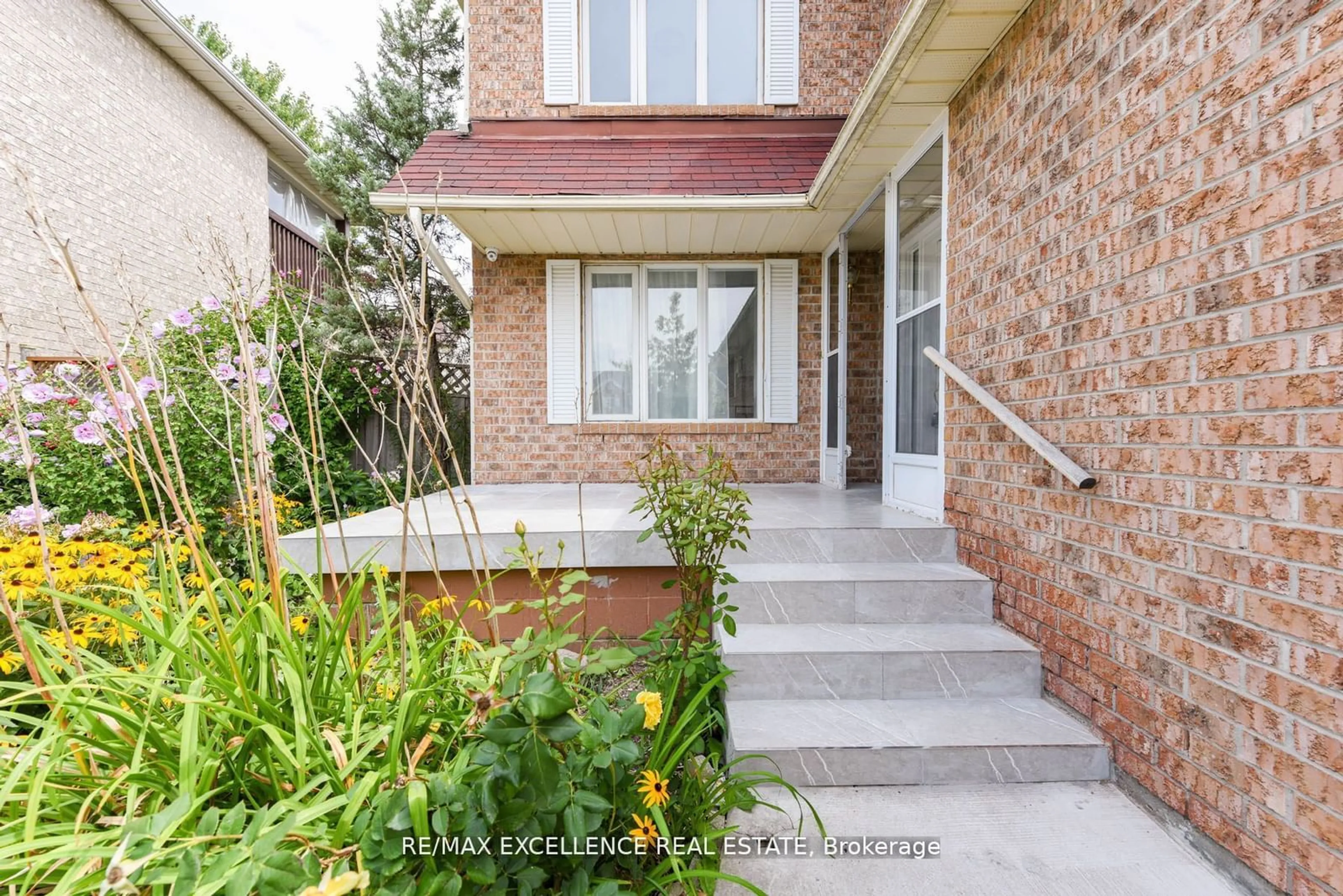 Home with brick exterior material for 61 Drinkwater Rd, Brampton Ontario L6Y 4T8