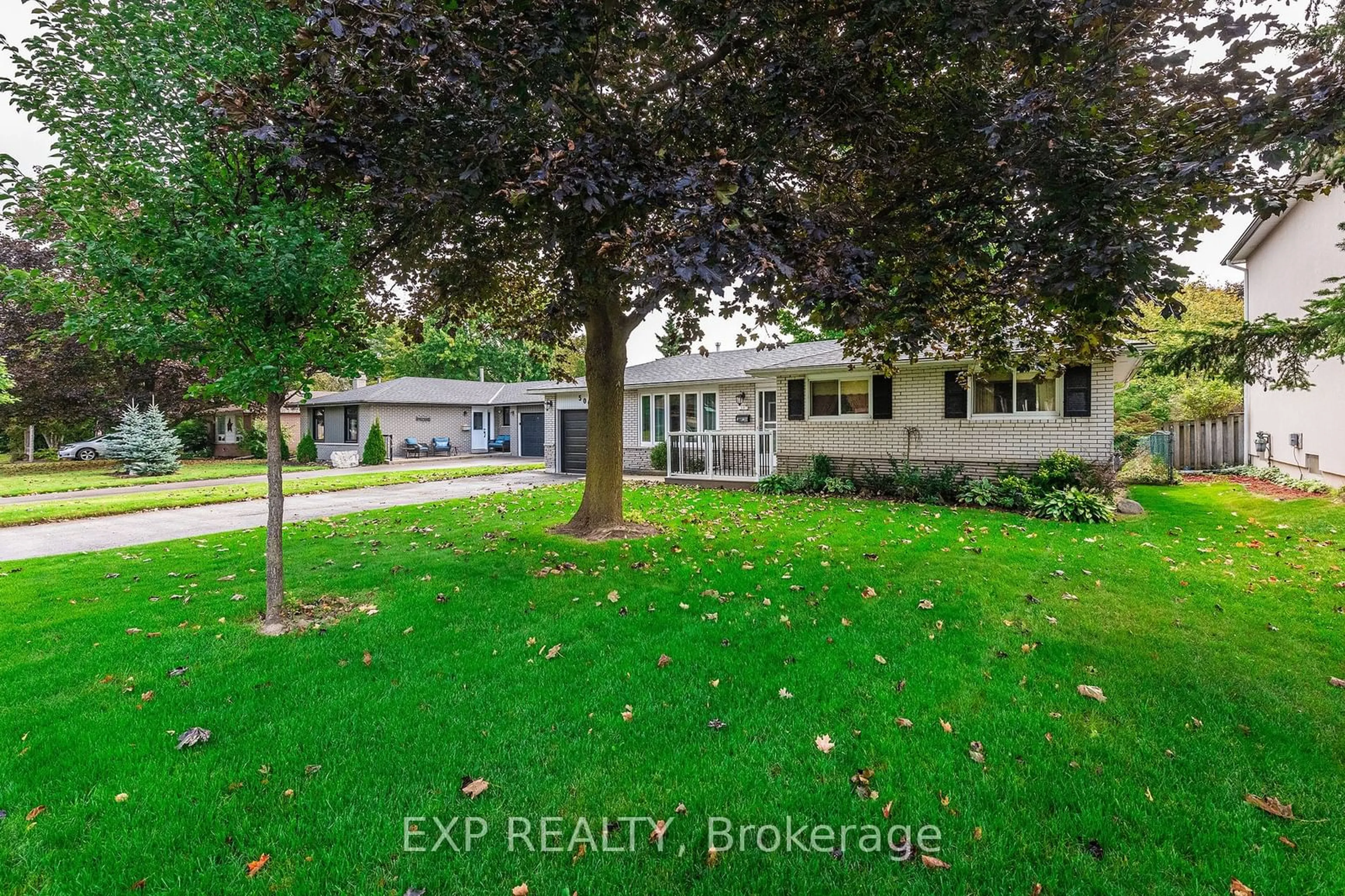 Frontside or backside of a home, the fenced backyard for 50 Parkview Dr, Orangeville Ontario L9W 1T3