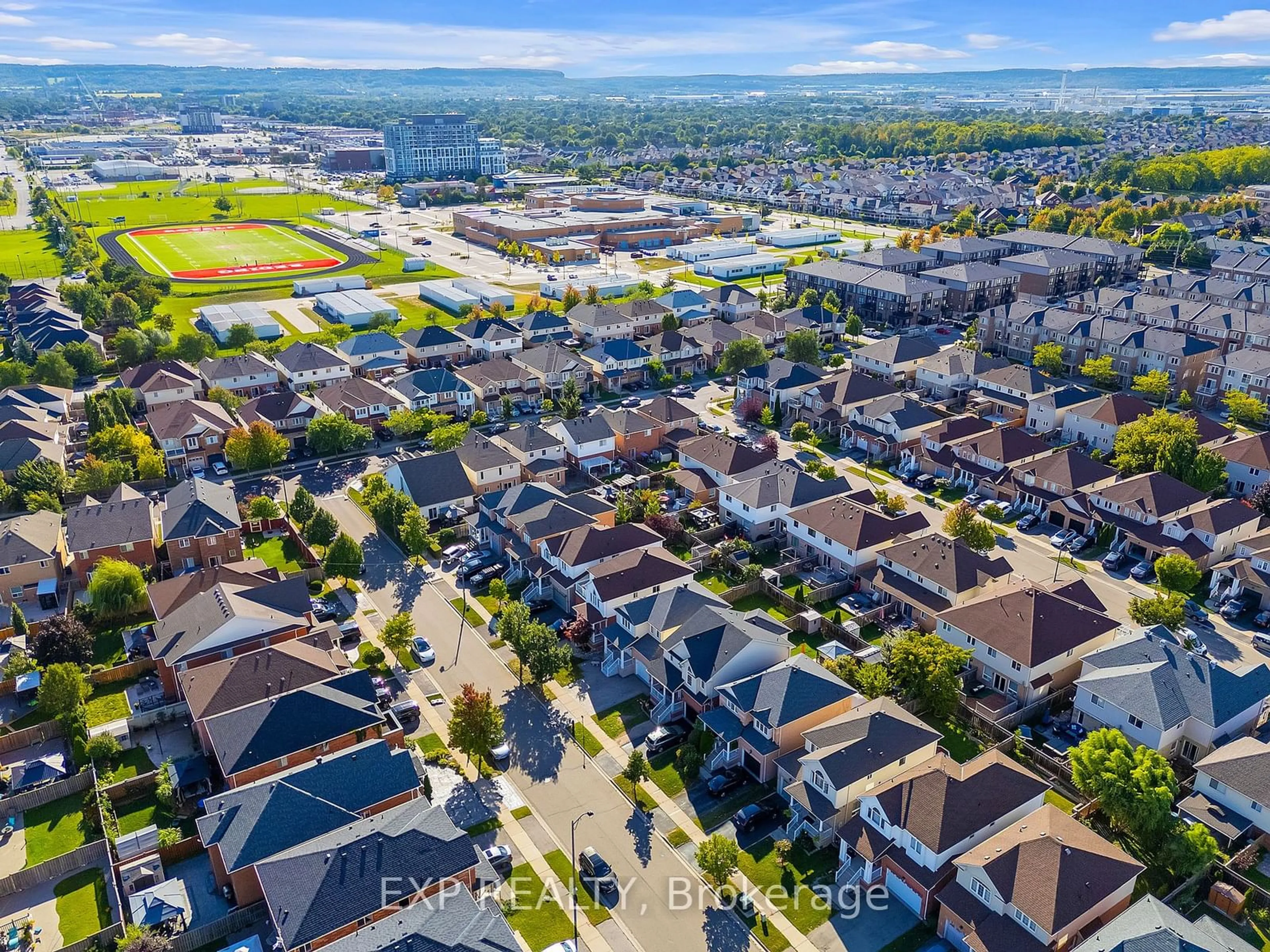 A pic from exterior of the house or condo, the street view for 183 Featherstone Rd, Milton Ontario L9T 6B8