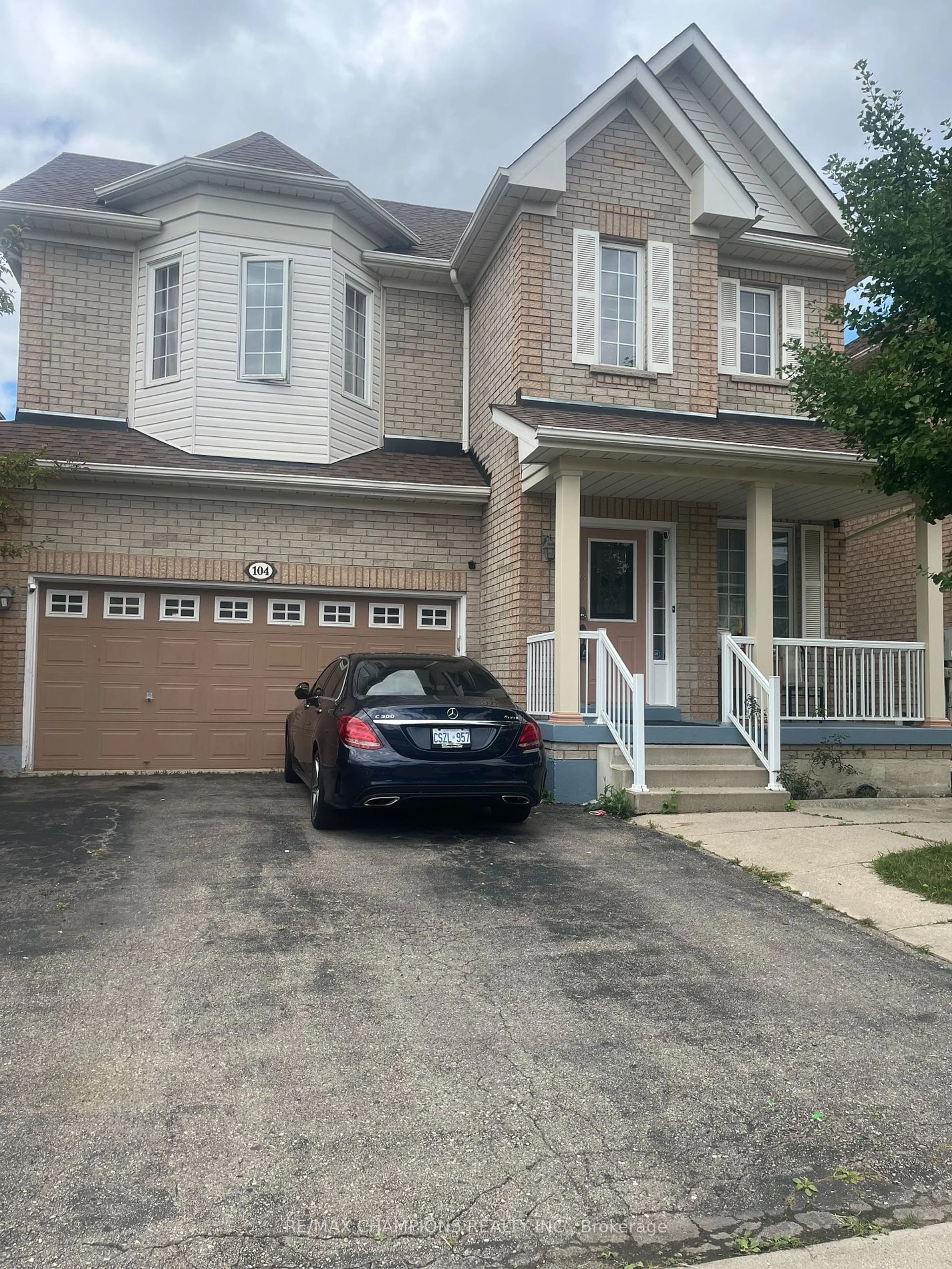 A pic from exterior of the house or condo, the street view for 104 Masters Green Cres, Brampton Ontario L7A 3K2