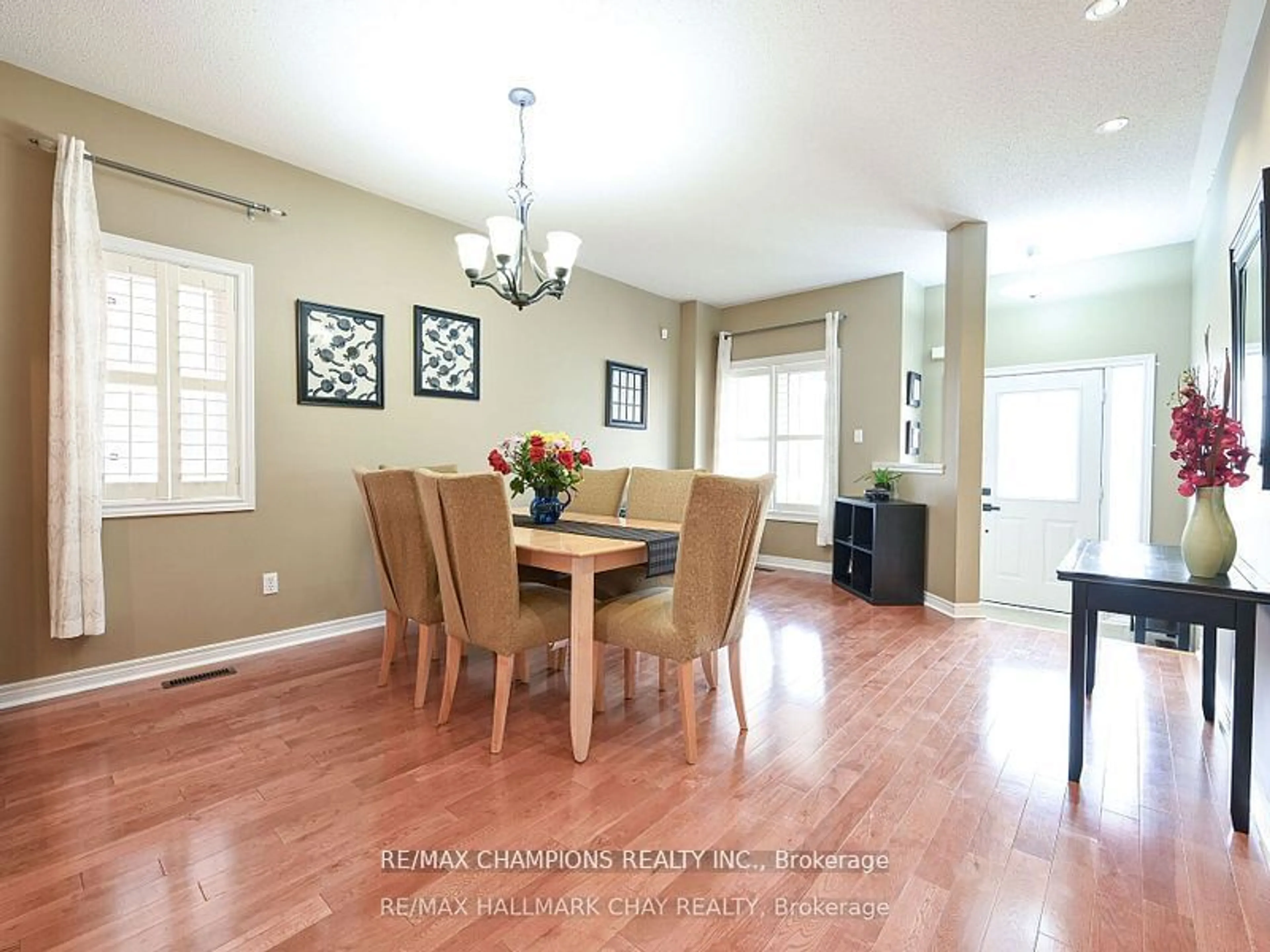 Dining room, wood floors for 104 Masters Green Cres, Brampton Ontario L7A 3K2