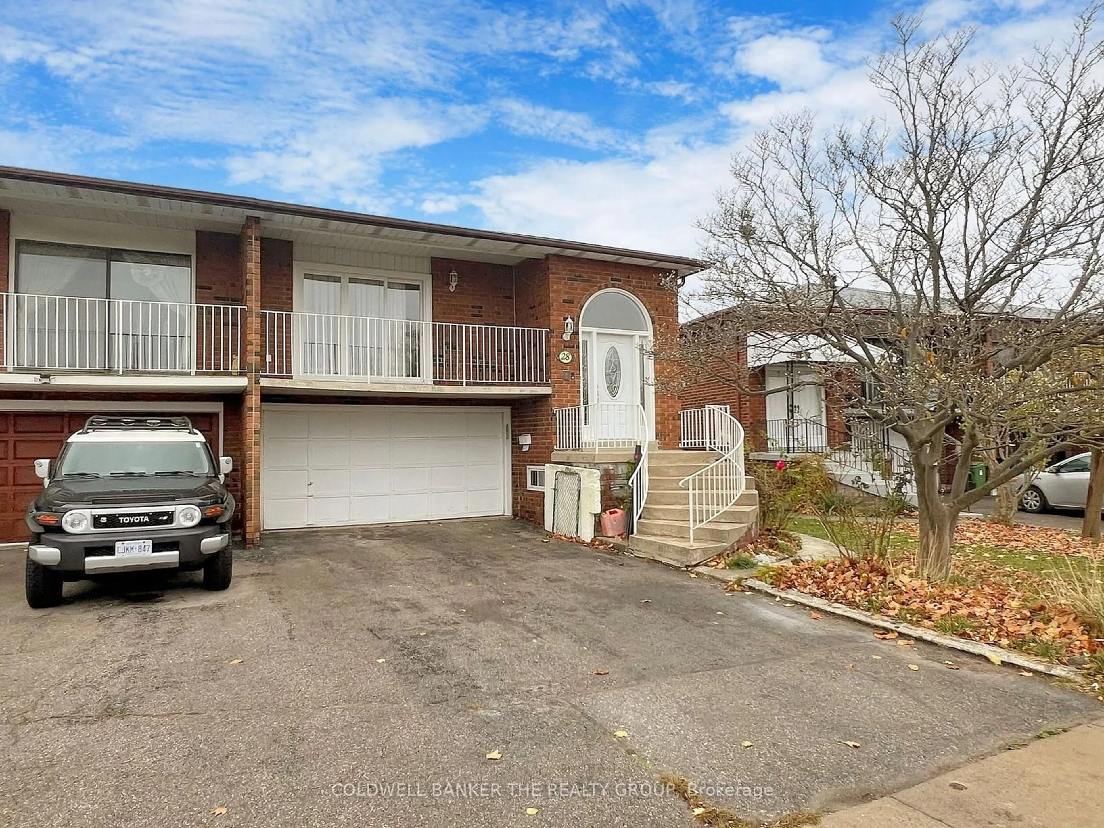 A pic from exterior of the house or condo, the street view for 28 Sawmill Rd, Toronto Ontario M3L 2M2