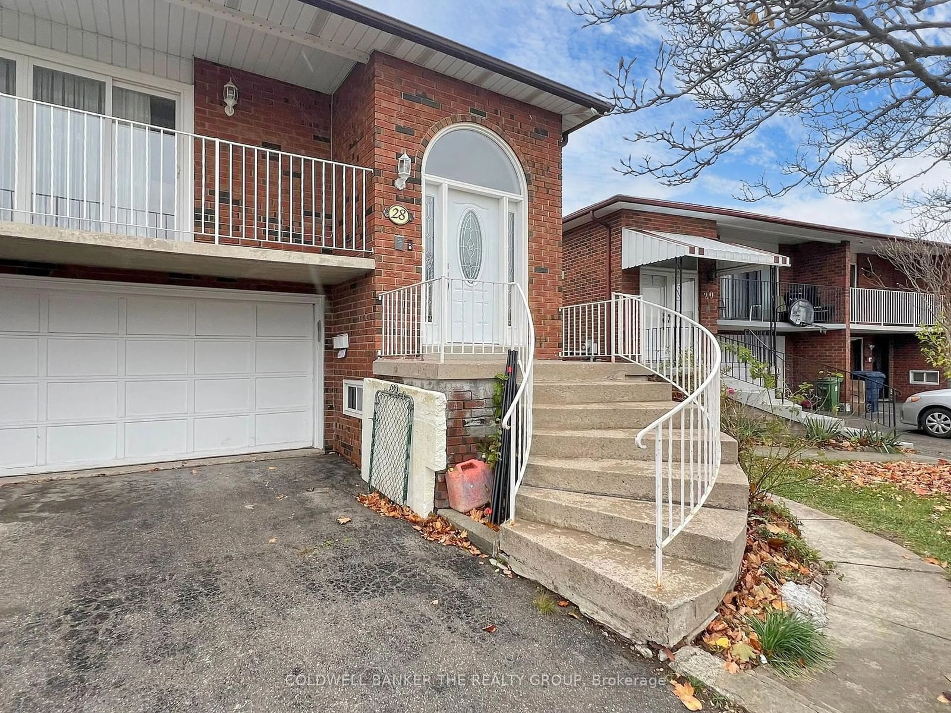 Frontside or backside of a home, the street view for 28 Sawmill Rd, Toronto Ontario M3L 2M2