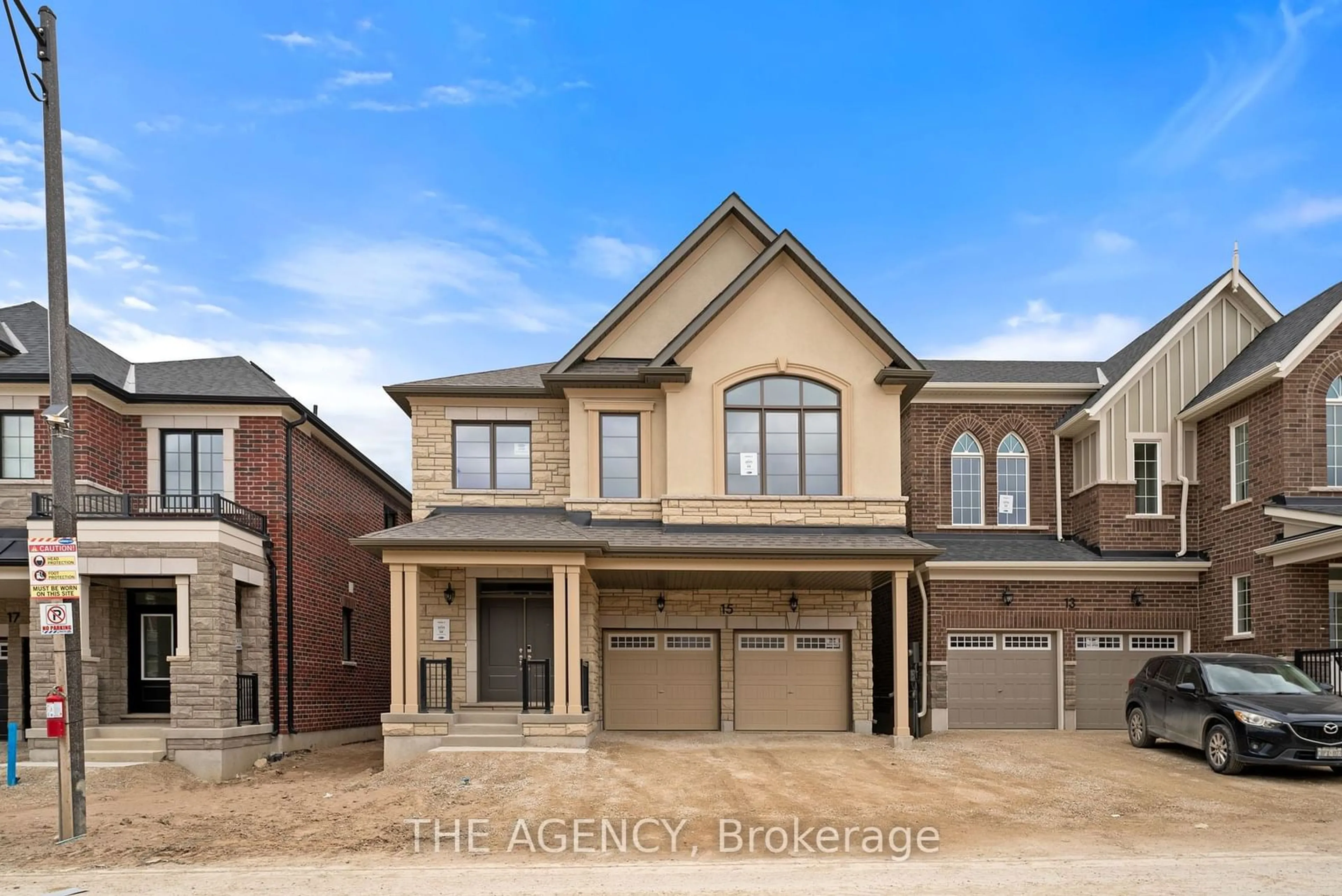 Frontside or backside of a home, the street view for 15 Aster Woods Dr, Caledon Ontario L7C 3H1