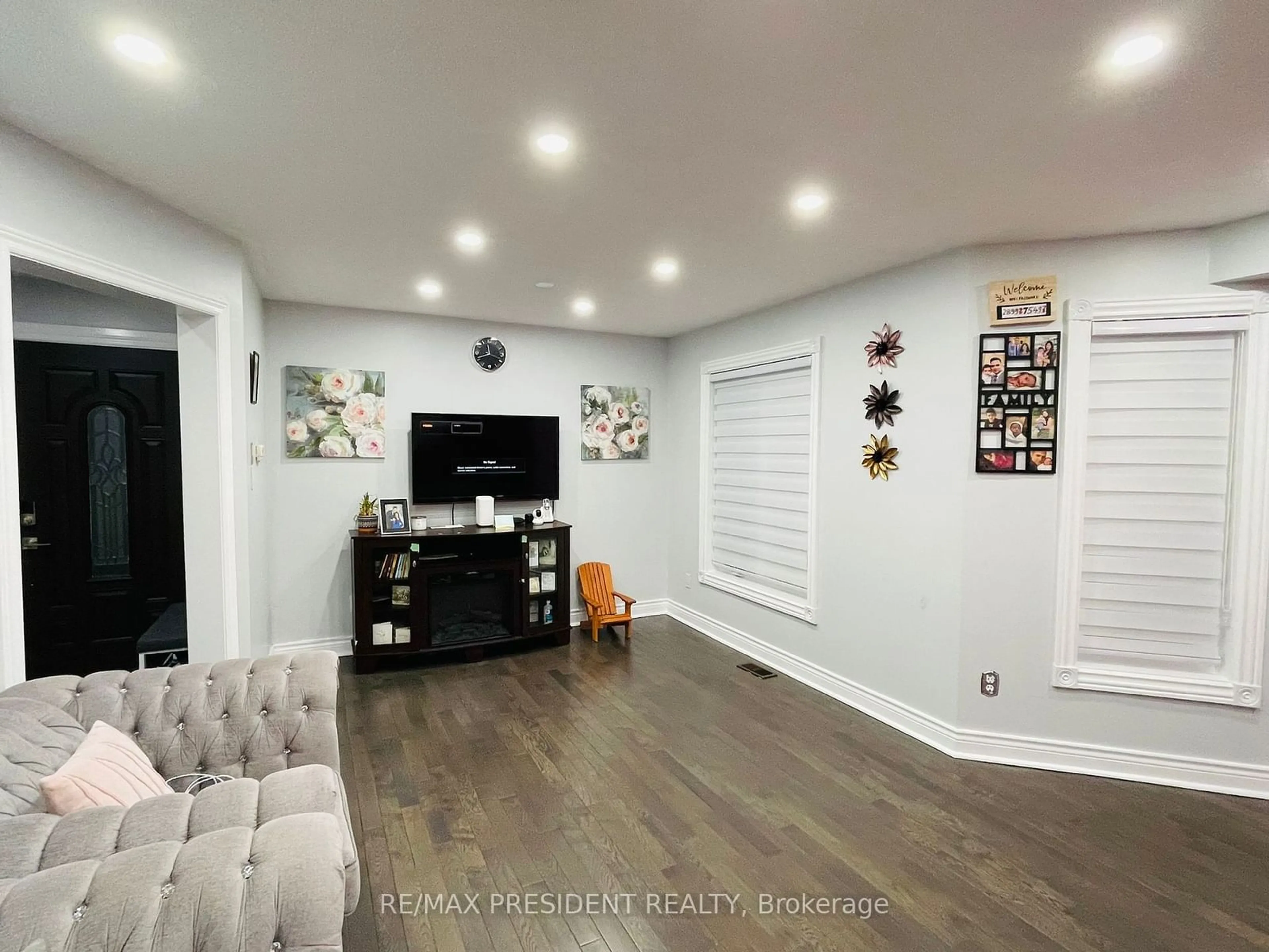 A pic of a room, wood floors for 19 Quail Feather Cres, Brampton Ontario L6R 1S7