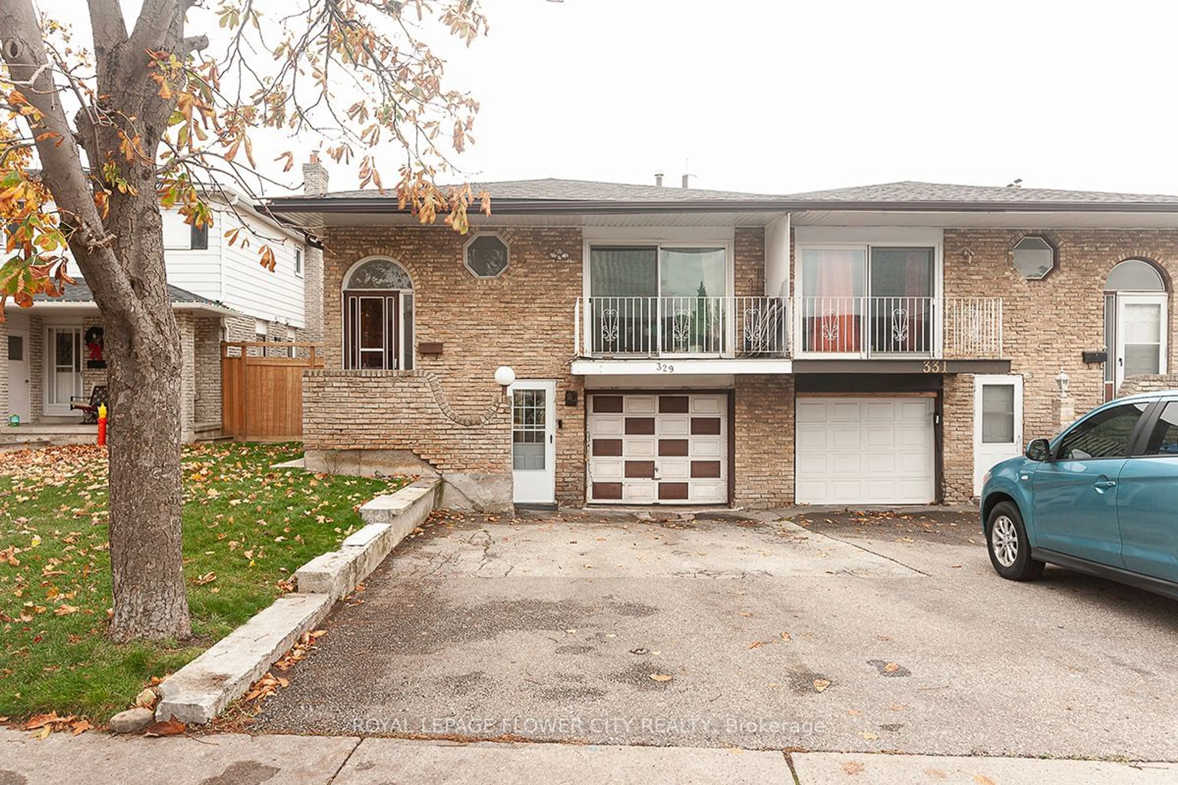 A pic from exterior of the house or condo, the street view for 329 Hansen Rd, Brampton Ontario L6V 2Y2