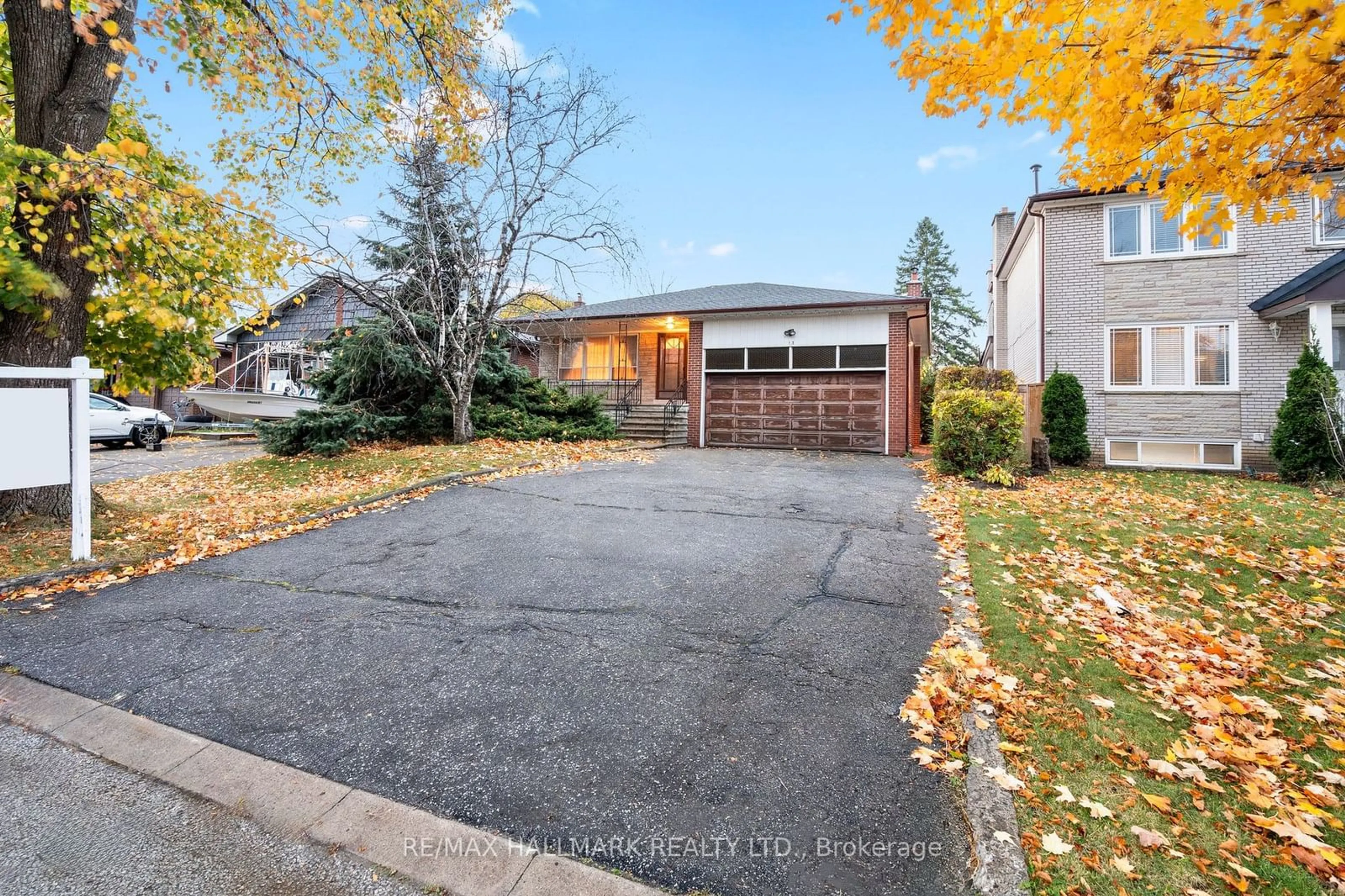 Frontside or backside of a home, the street view for 13 Hawthorne Rd, Toronto Ontario M9R 1N9