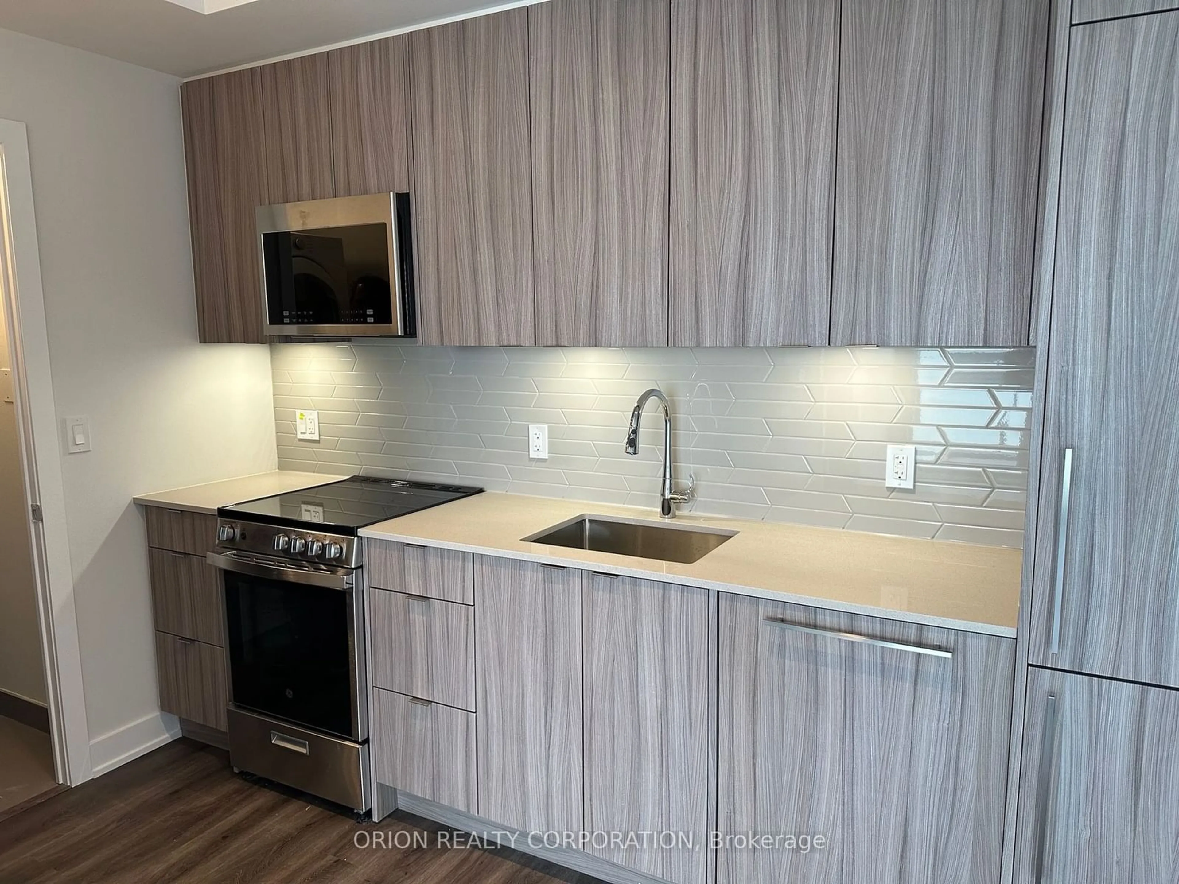 Standard kitchen, wood floors for 4130 Parkside Village Dr #2211, Mississauga Ontario L5B 3M8