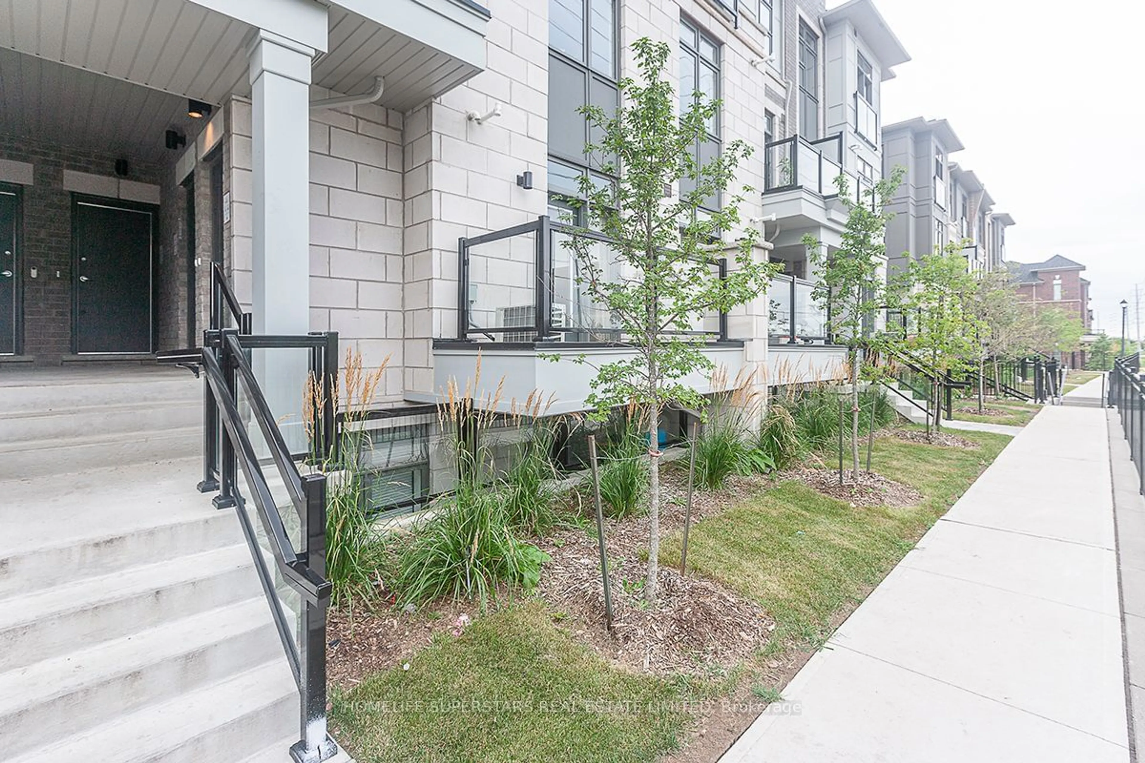 A pic from exterior of the house or condo, the street view for 20 Halliford Pl #110, Brampton Ontario L6P 4R1