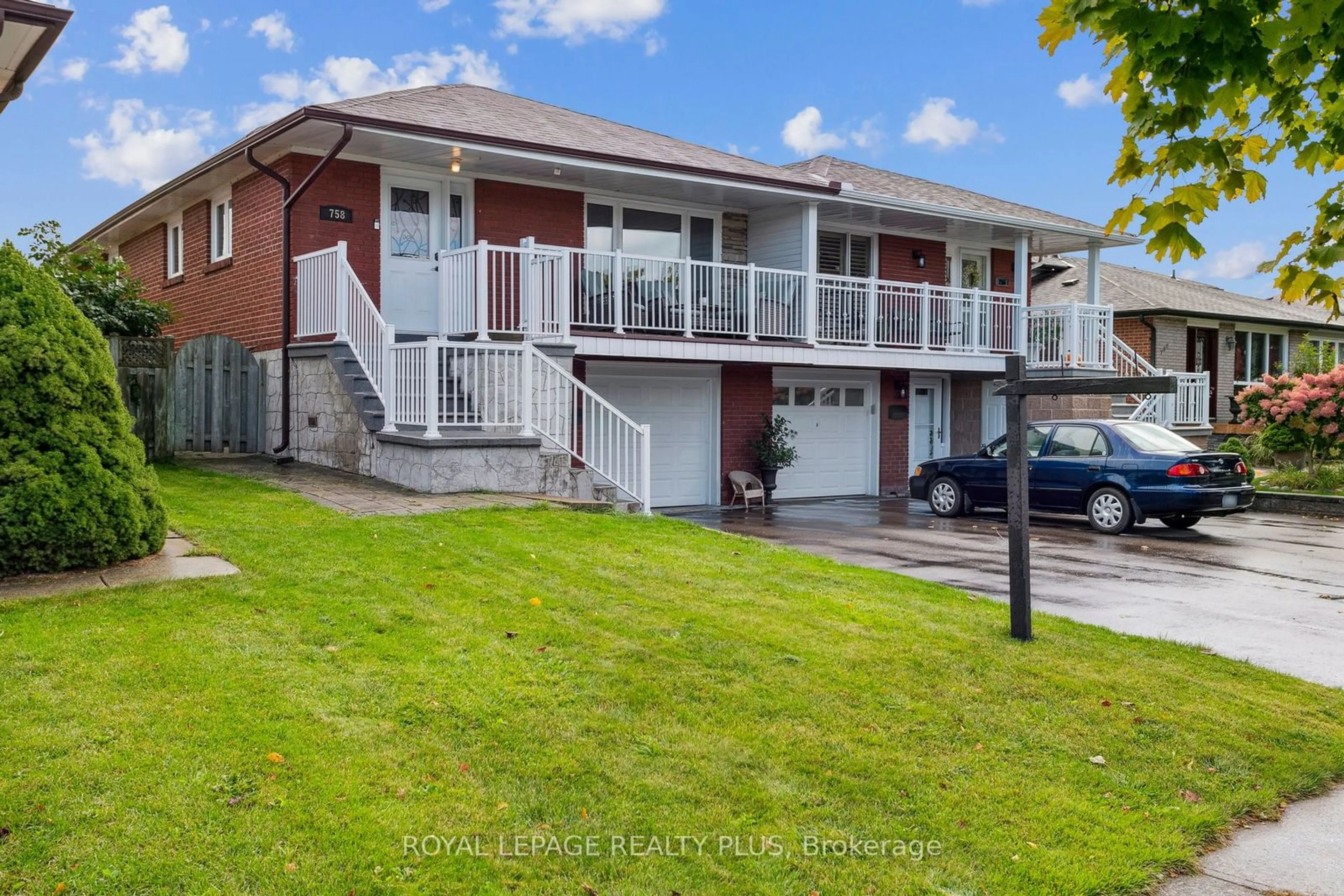 Frontside or backside of a home, the fenced backyard for 758 Greenore Rd, Mississauga Ontario L4Y 2V4