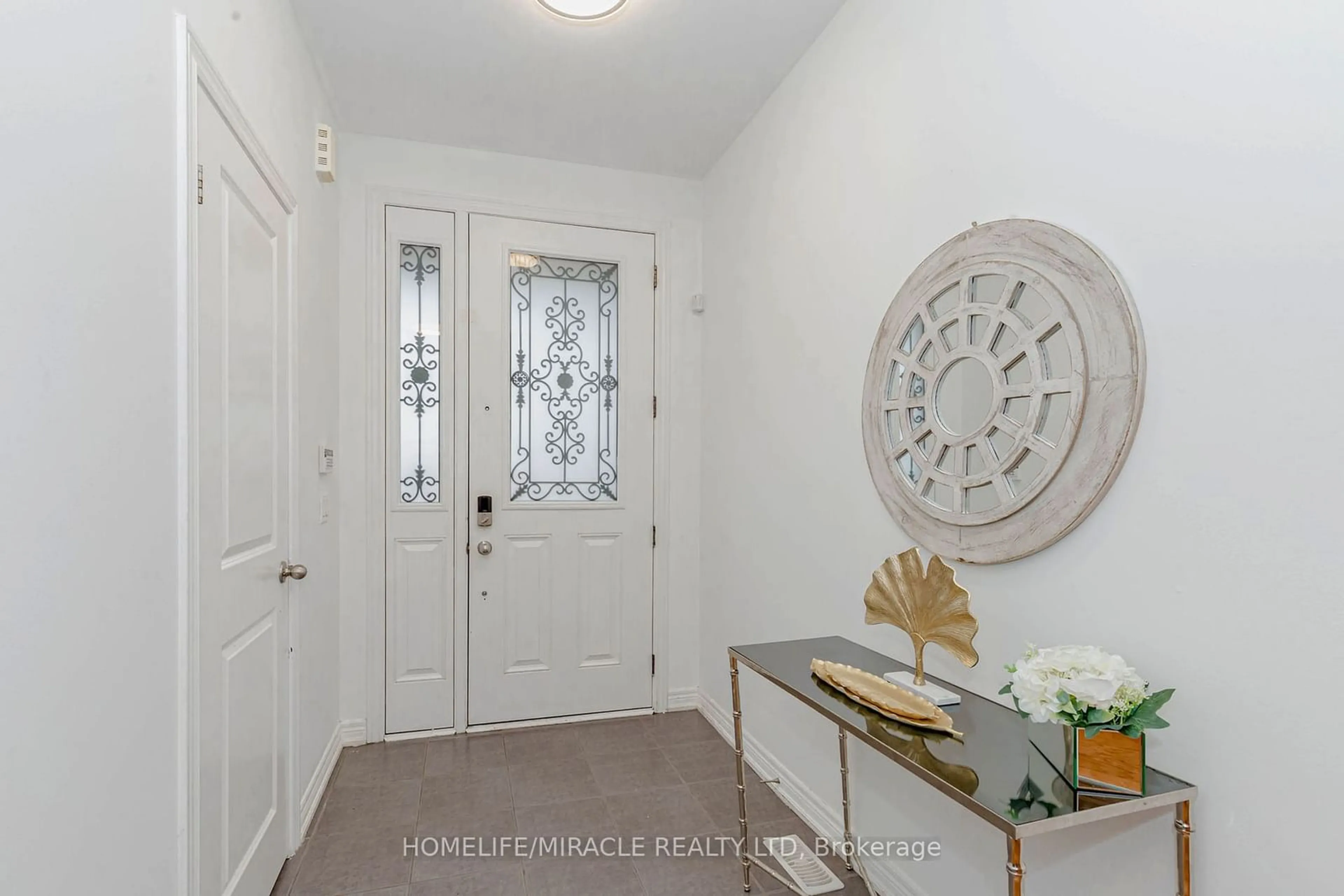 Indoor entryway, wood floors for 9 Dufay Rd, Brampton Ontario L7A 4A1