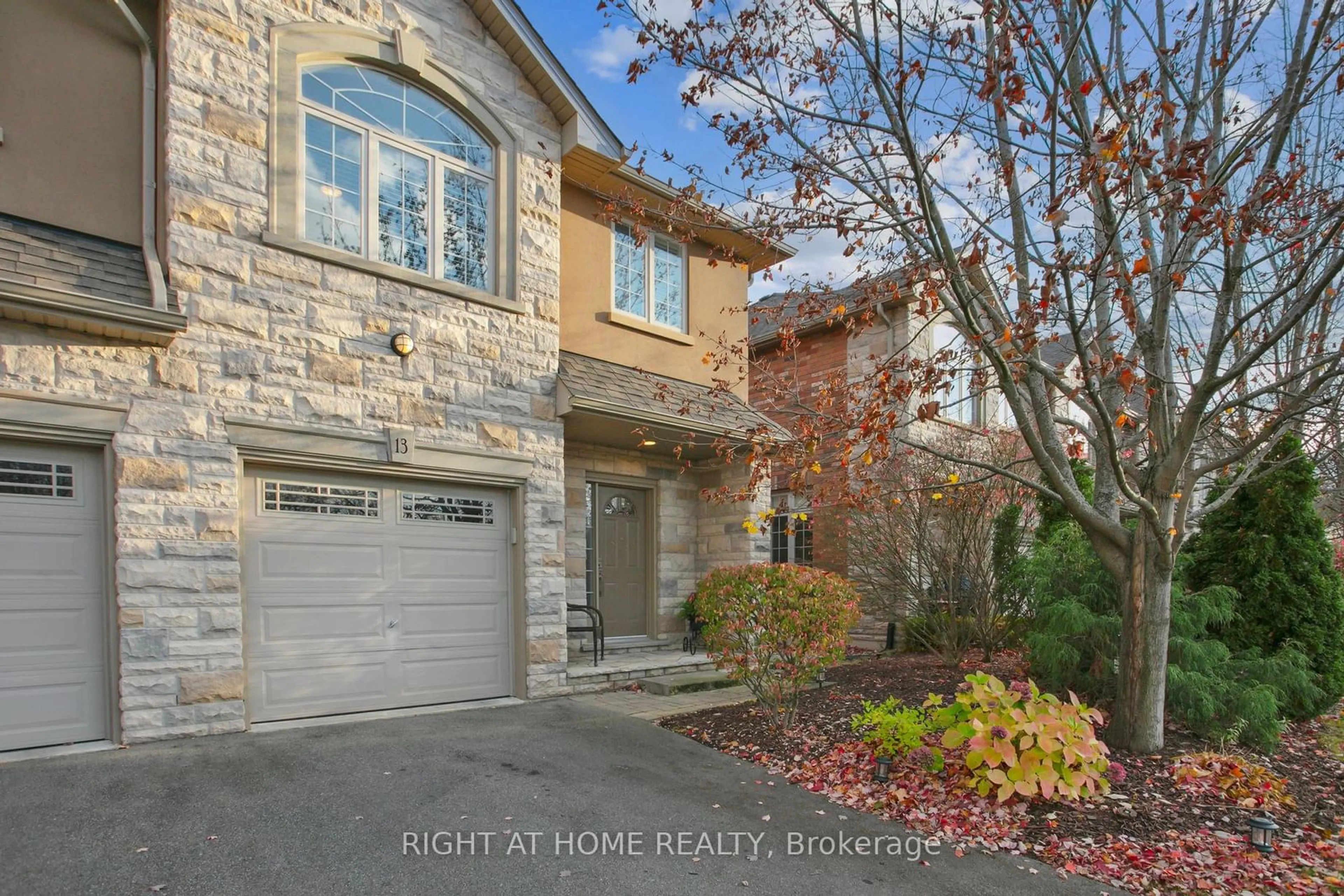 A pic from exterior of the house or condo, the street view for 2282 Orchard Rd #13, Burlington Ontario L7L 0B5