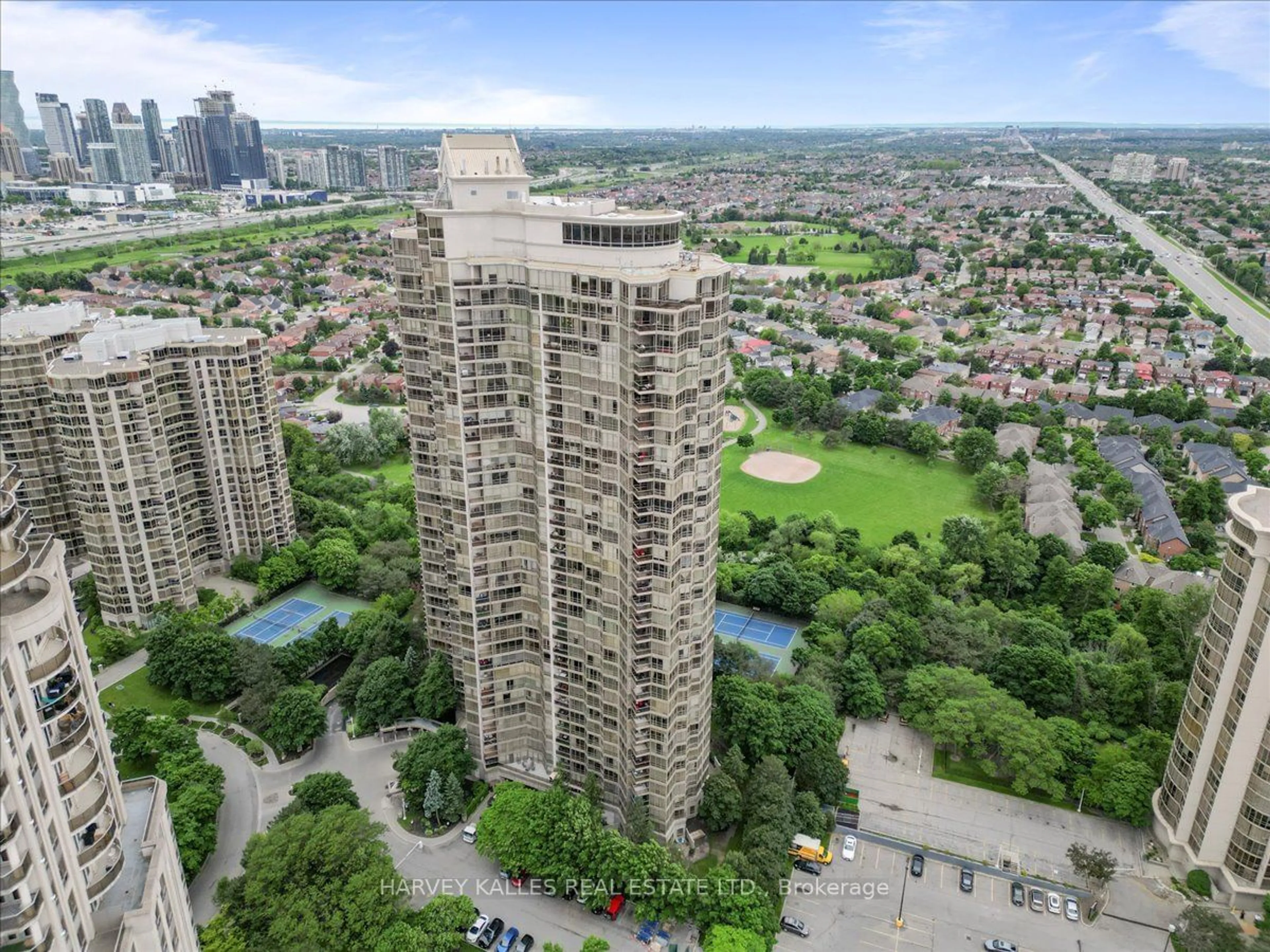 A pic from exterior of the house or condo, the view of city buildings for 45 Kingsbridge Garden Circ #404, Mississauga Ontario L5R 3K4