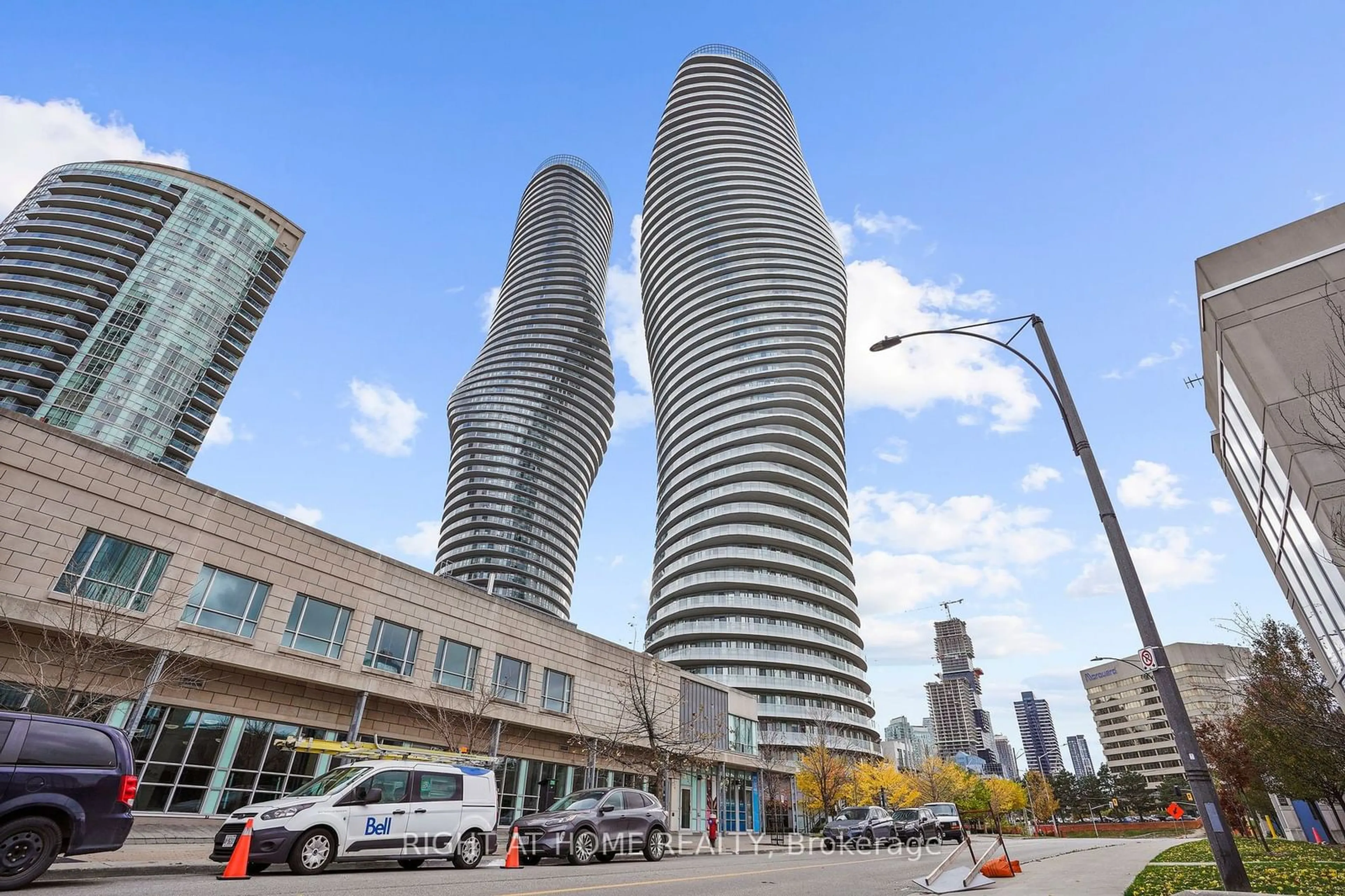 A pic from exterior of the house or condo, the view of city buildings for 50 Absolute Ave #2405, Mississauga Ontario L4Z 0A8