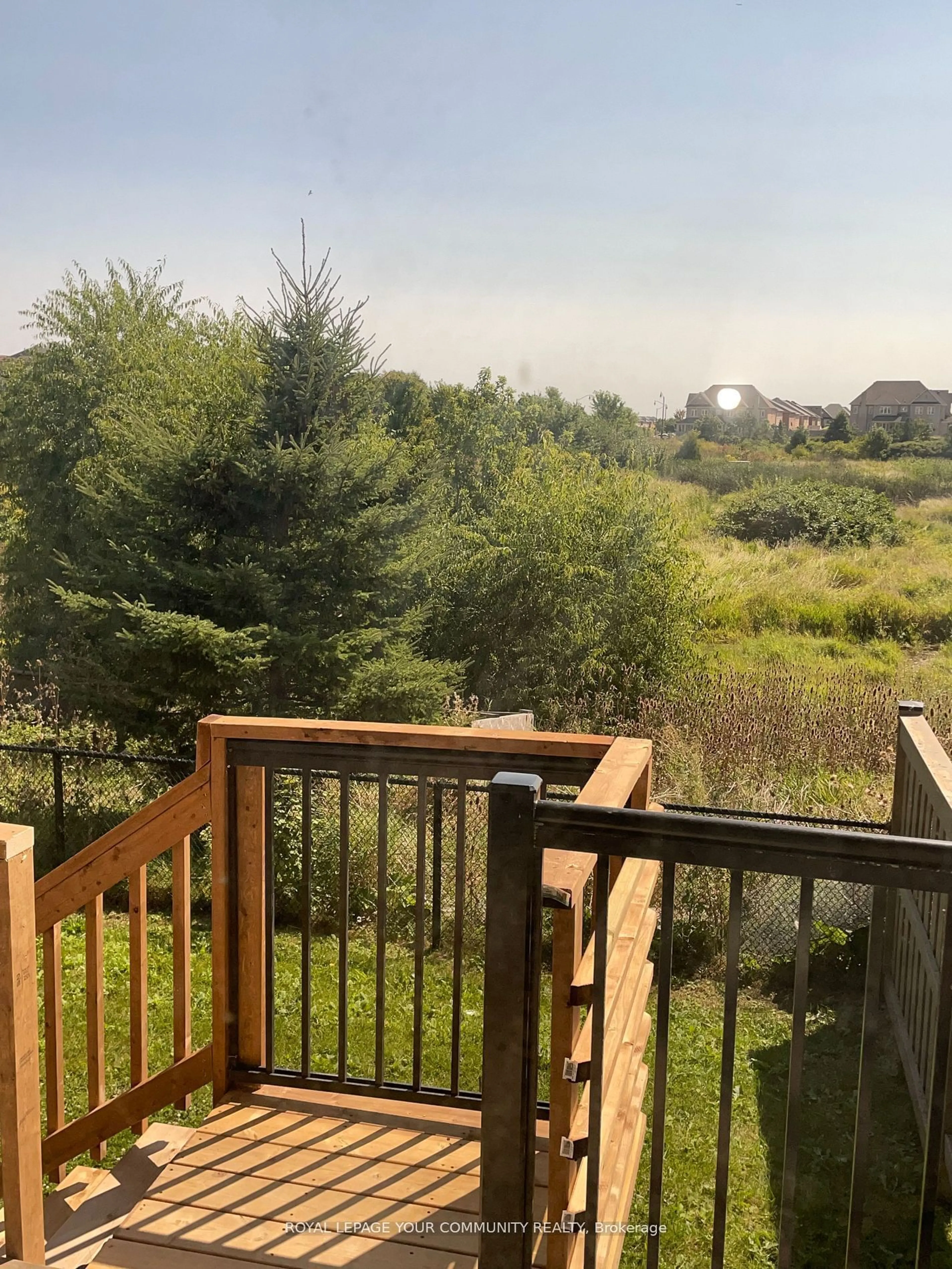 Balcony in the apartment, the fenced backyard for 16 Feldspar Gate, Brampton Ontario L6X 5R6