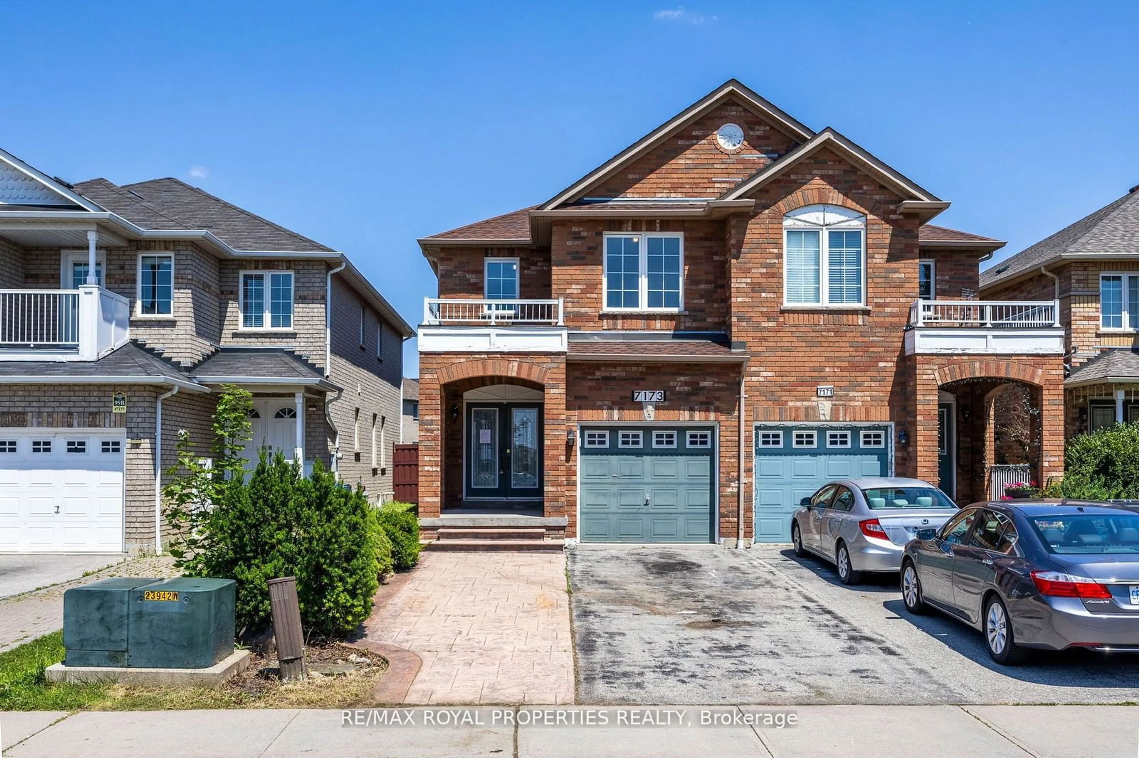 Home with brick exterior material for 7173 Village Walk, Mississauga Ontario L5W 1X2