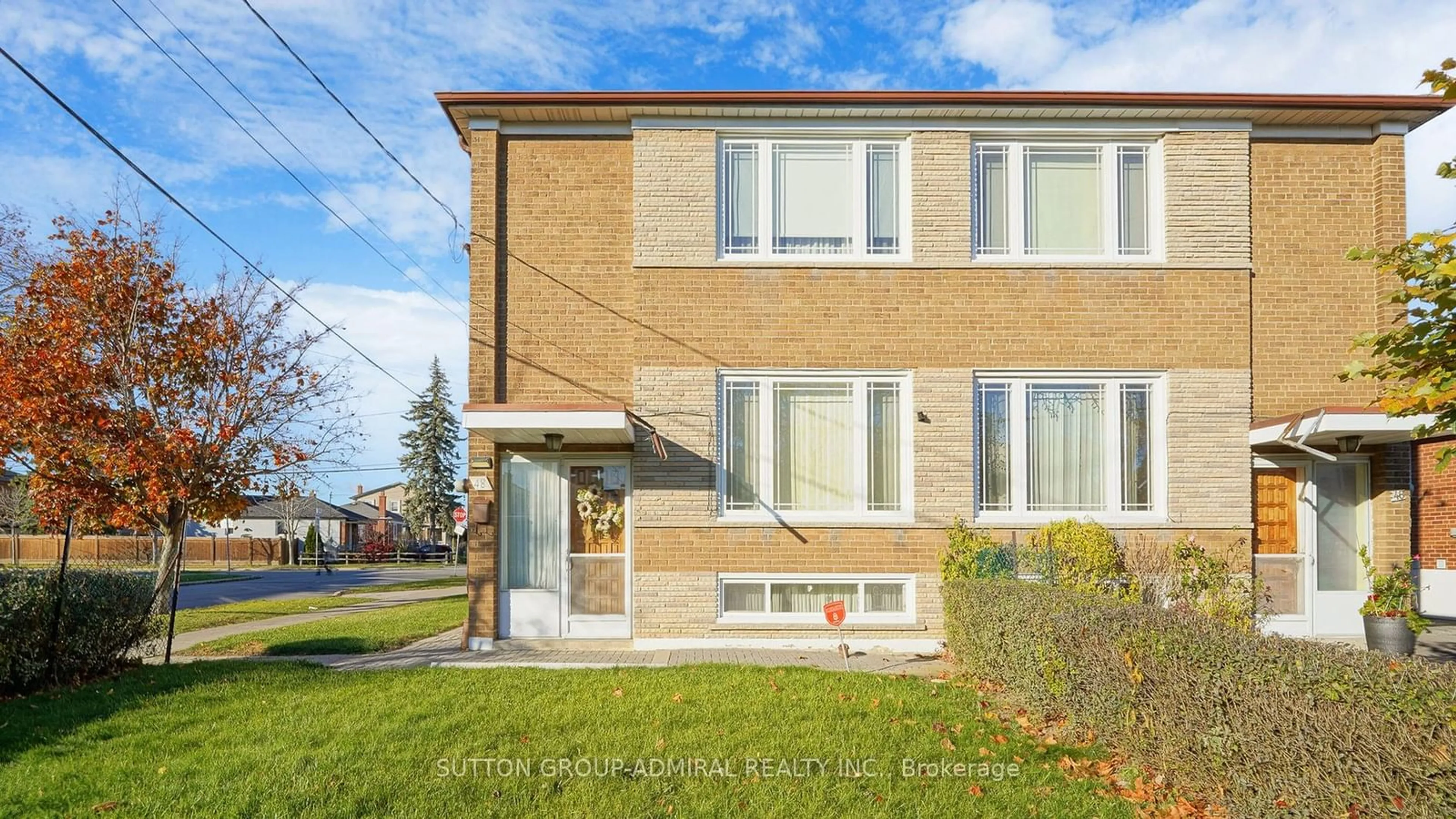 A pic from exterior of the house or condo, the front or back of building for 48 Dubray Ave, Toronto Ontario M3K 1V5