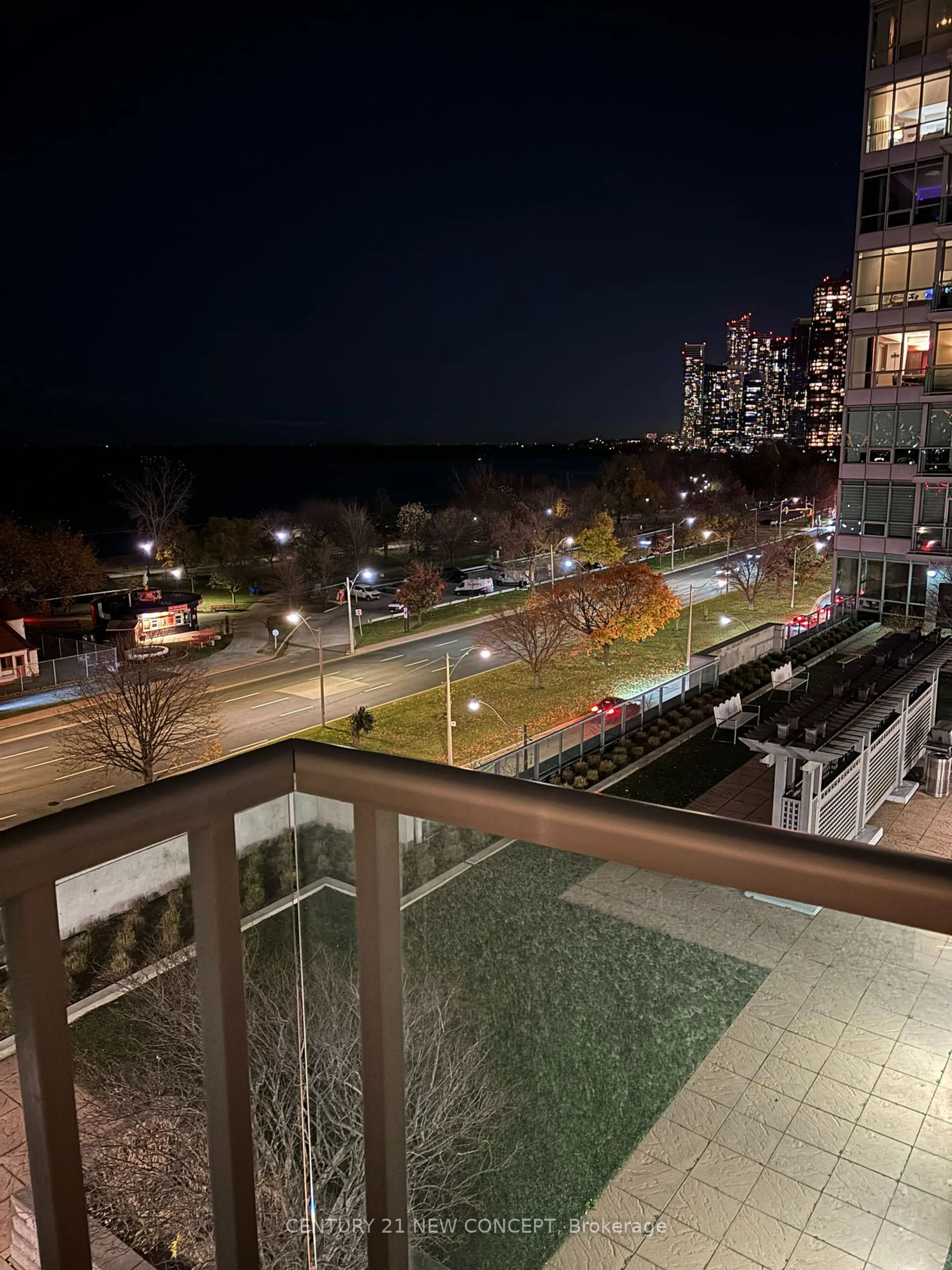 A pic from exterior of the house or condo, the fenced backyard for 1900 Lake Shore Blvd #704, Toronto Ontario M6S 1A4