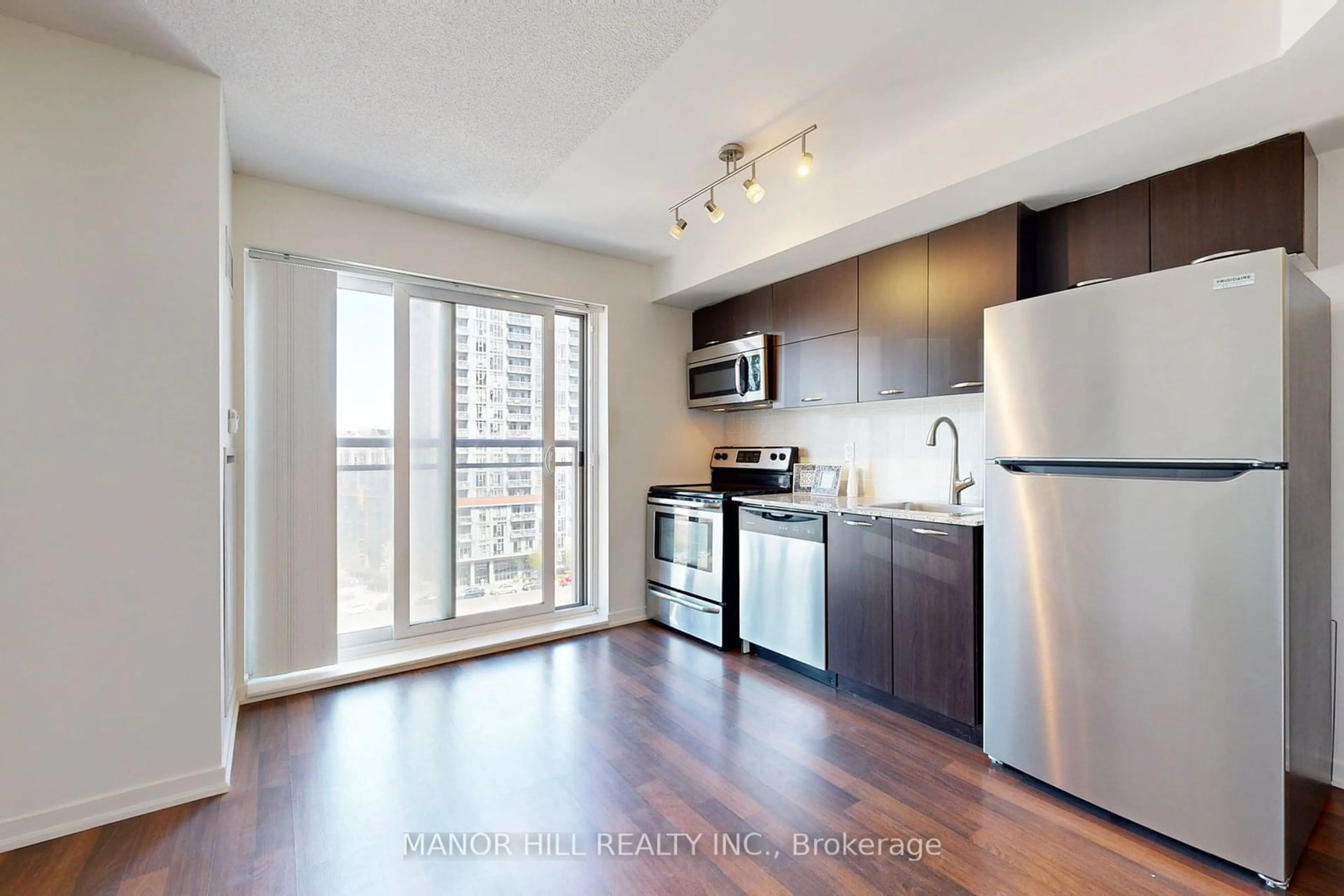 Standard kitchen, wood floors for 38 Joe Shuster Way #919, Toronto Ontario M6K 0A5