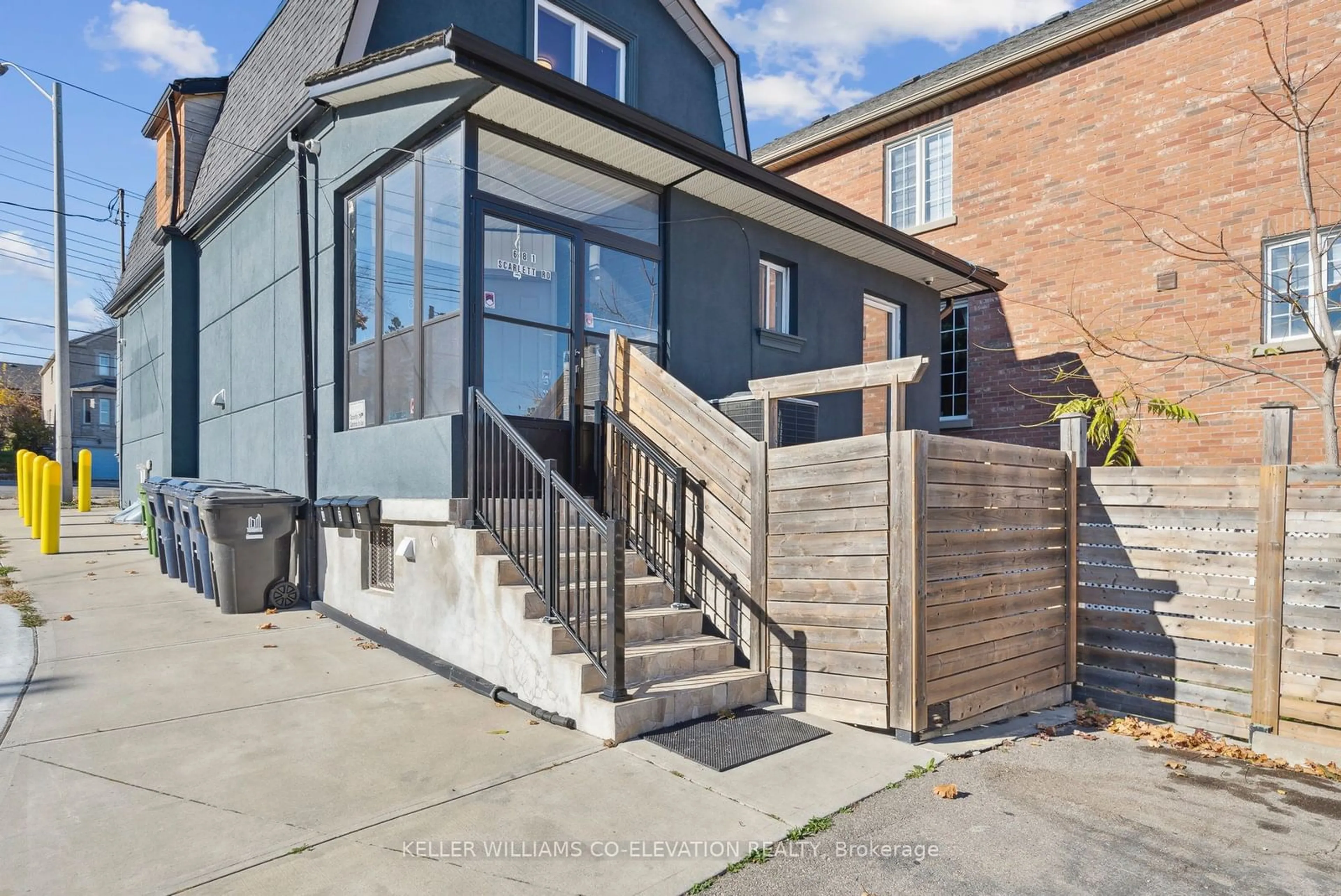 A pic from exterior of the house or condo, the fenced backyard for 681 Scarlett Rd, Toronto Ontario M9P 2T3