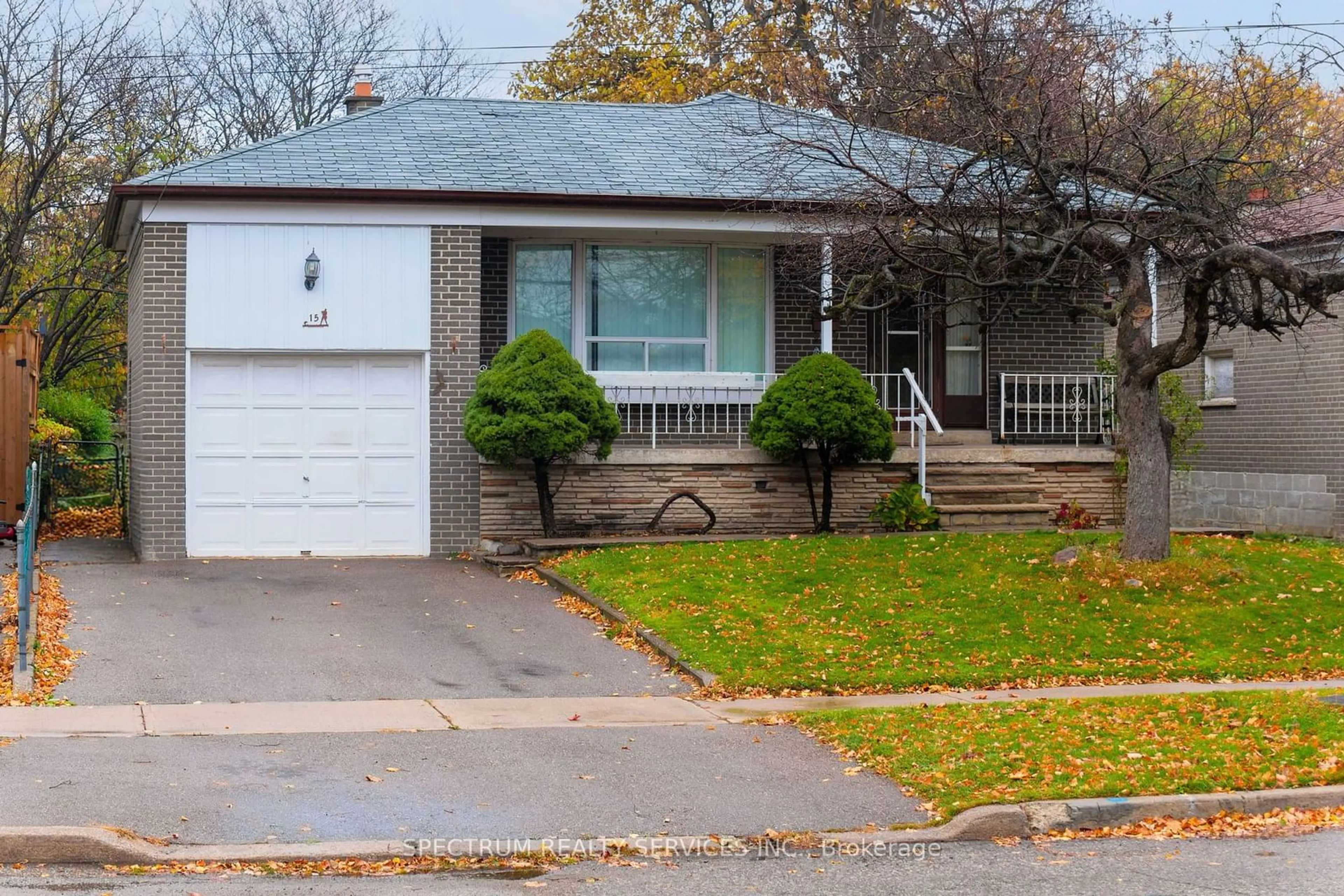 Frontside or backside of a home, the street view for 15 Braddock Rd, Toronto Ontario M9W 5H6