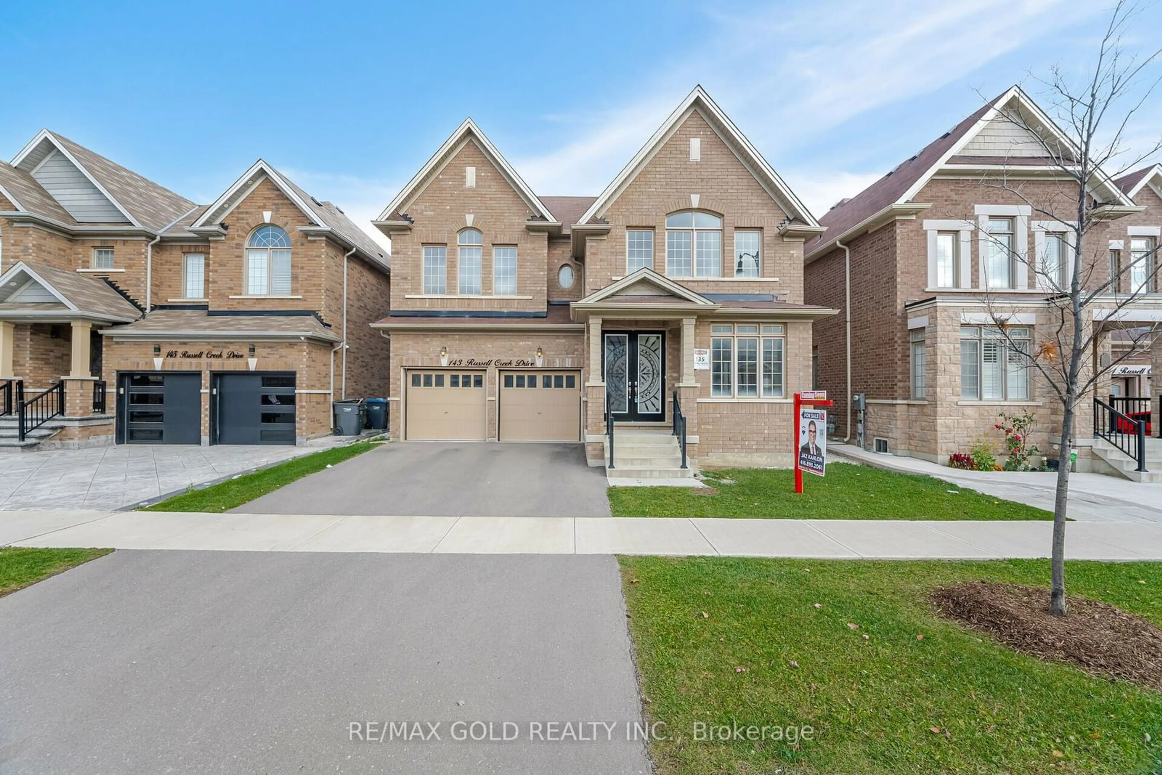 Frontside or backside of a home, the street view for 143 Russell Creek Dr, Brampton Ontario L6R 4B4