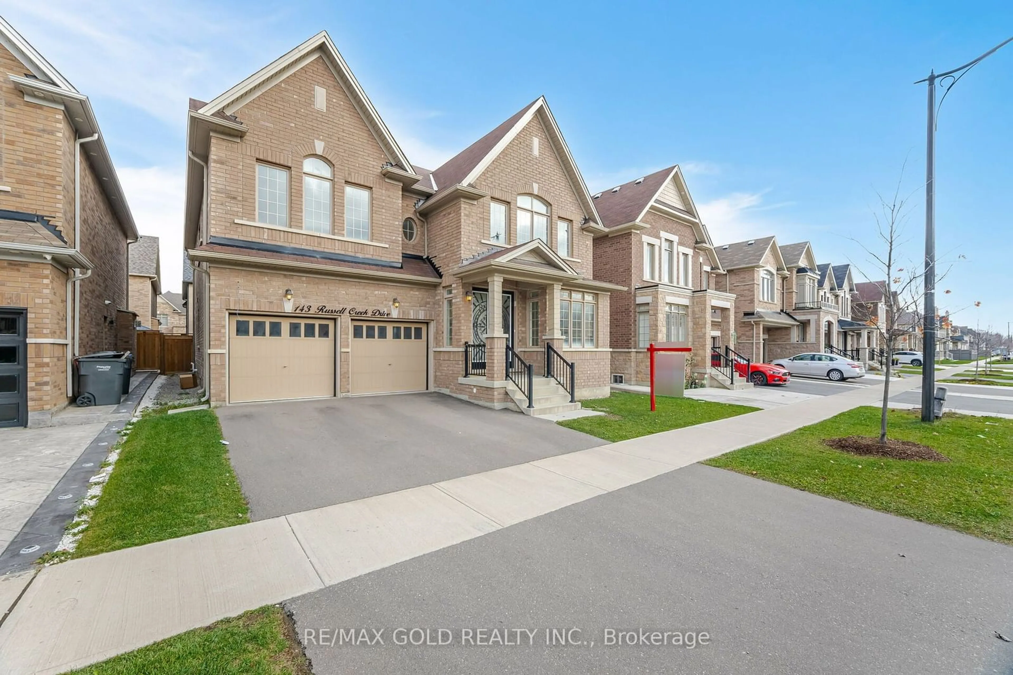 Frontside or backside of a home, the street view for 143 Russell Creek Dr, Brampton Ontario L6R 4B4