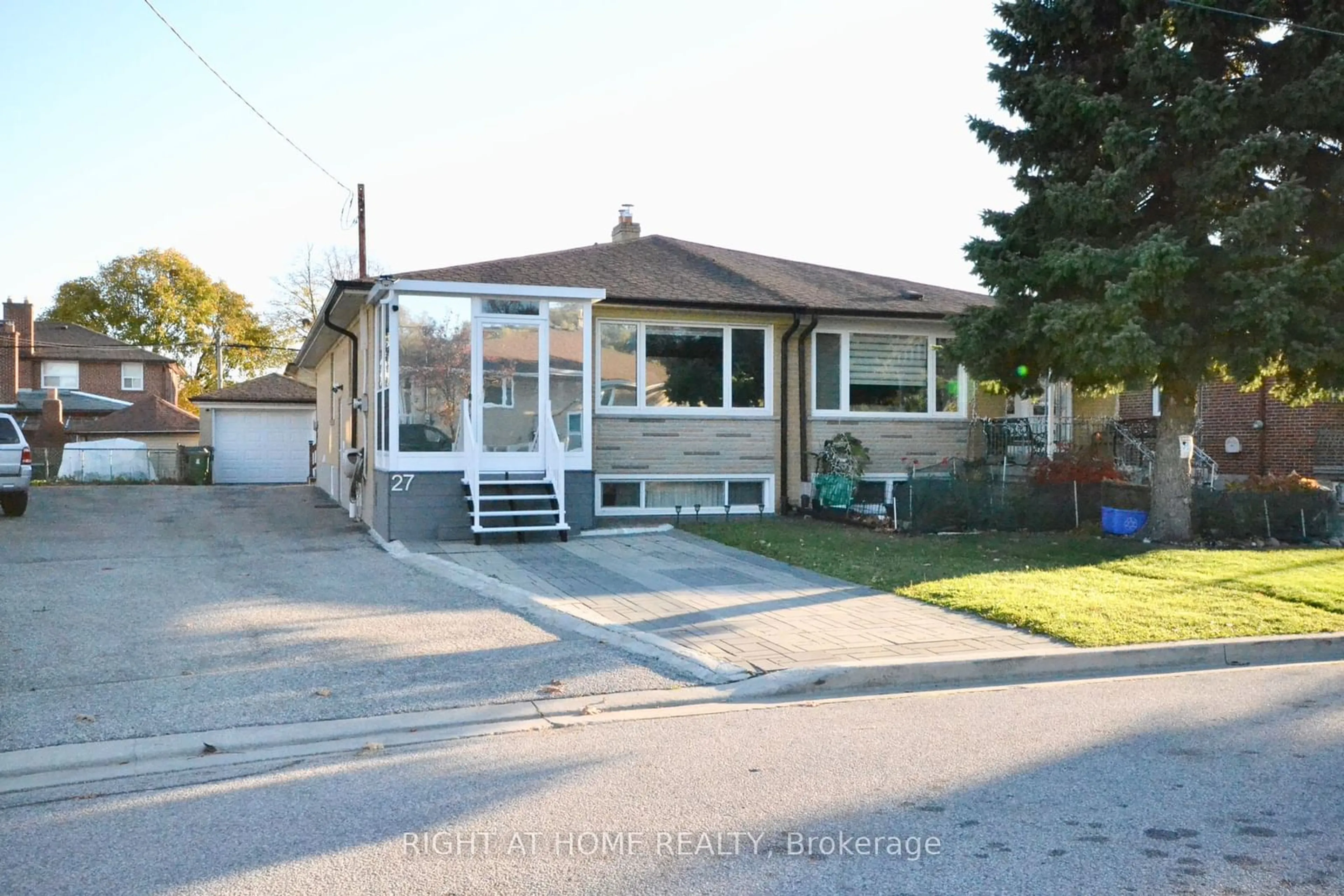 Frontside or backside of a home, the street view for 27 Cameo Cres, Toronto Ontario M6N 2K4