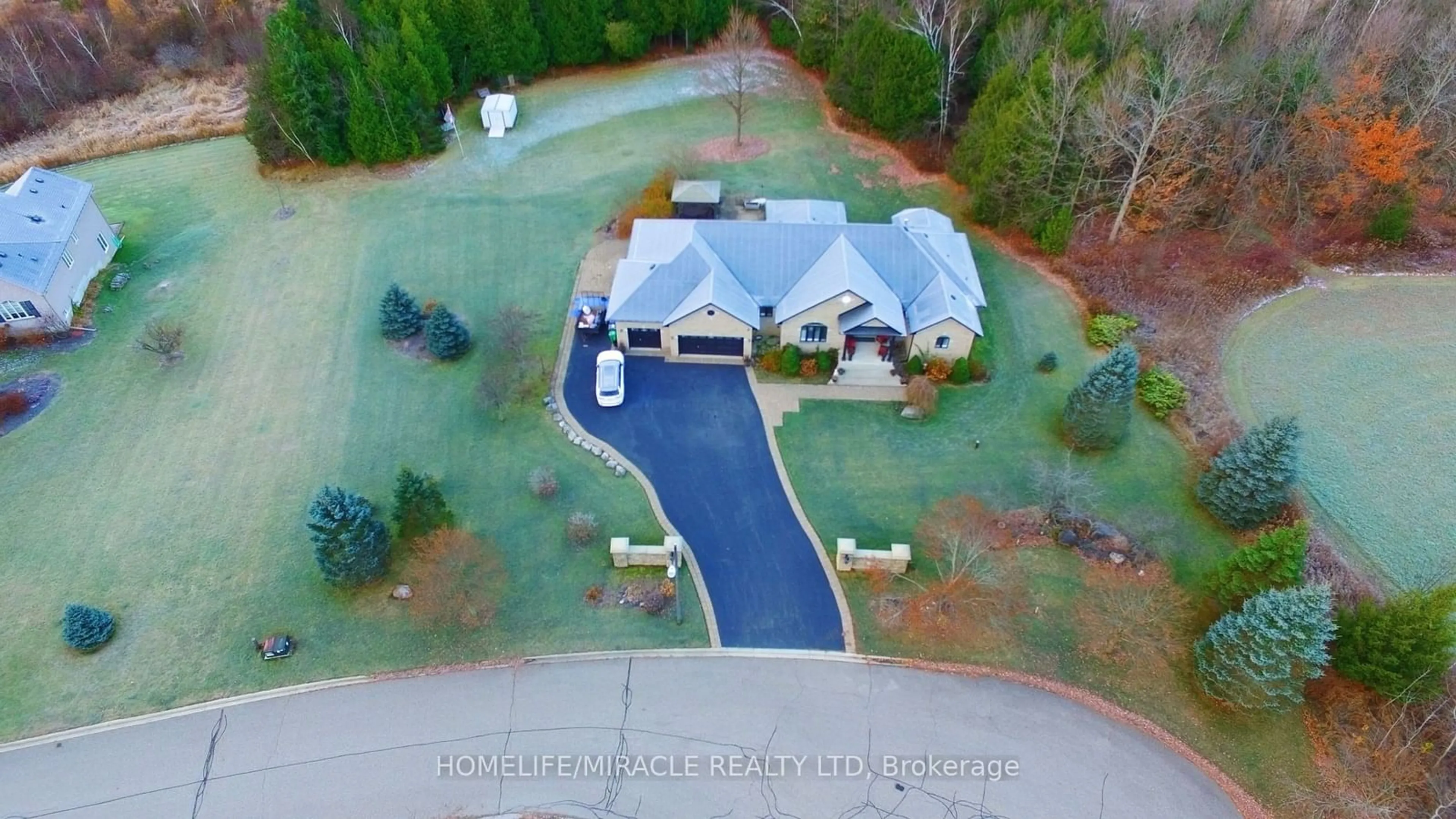 Frontside or backside of a home, the street view for 15 Rolling Meadow Dr, Caledon Ontario L7K 0N2