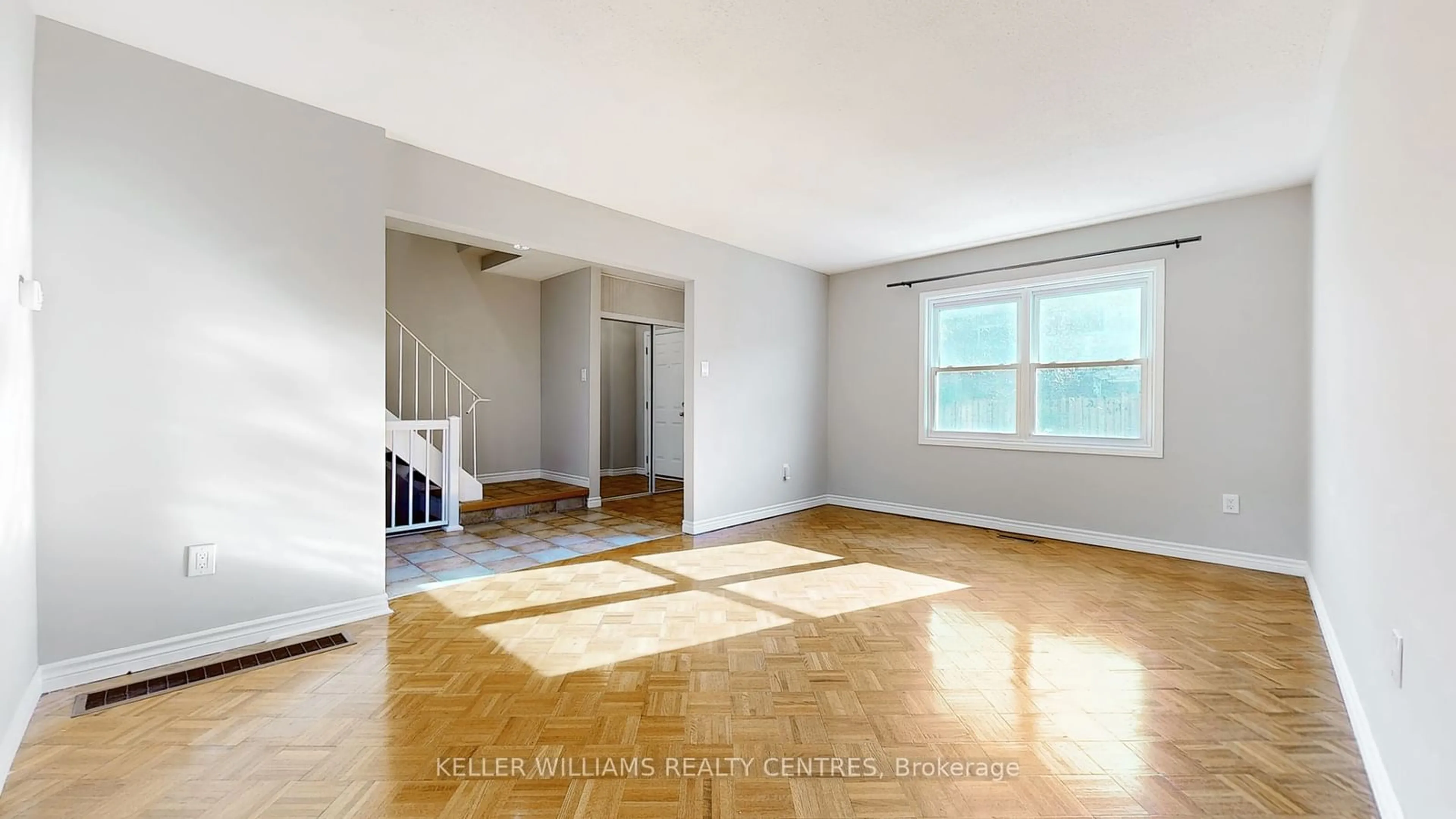 A pic of a room, wood floors for 2825 Gananoque Dr #43, Mississauga Ontario L5N 1V6