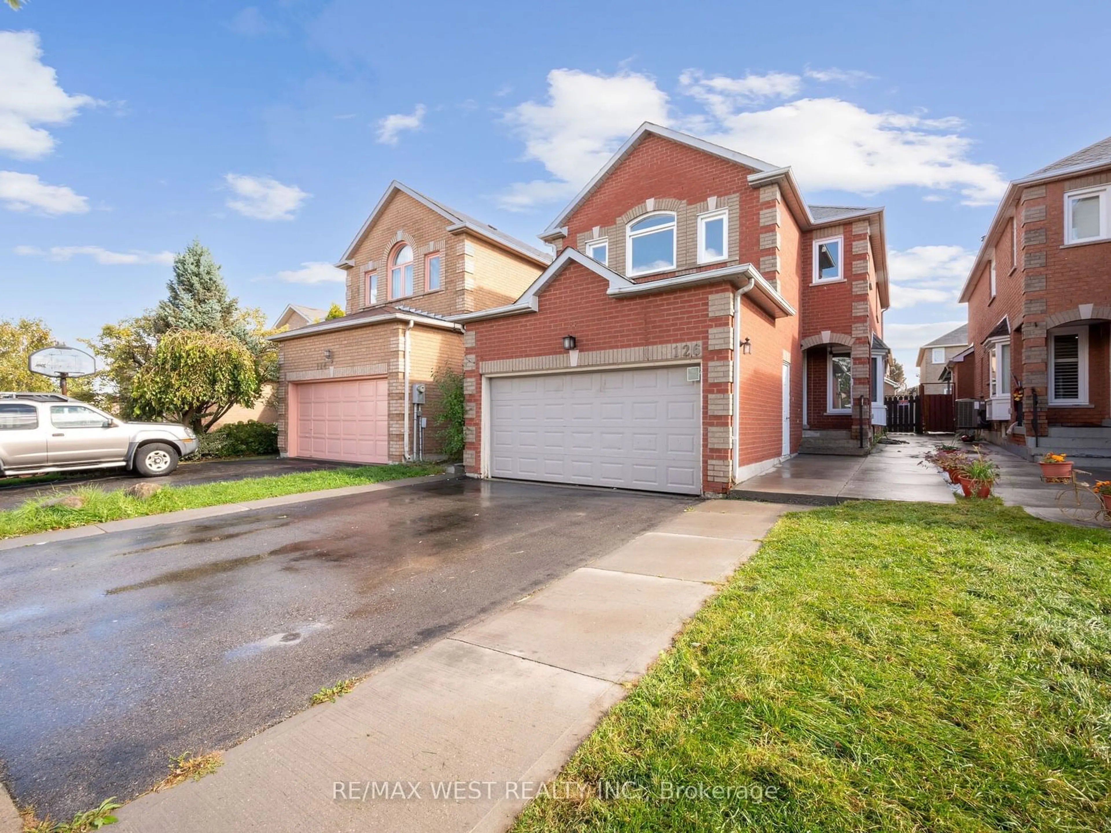 Frontside or backside of a home, the street view for 126 Sandmere Ave, Brampton Ontario L6Z 4A3