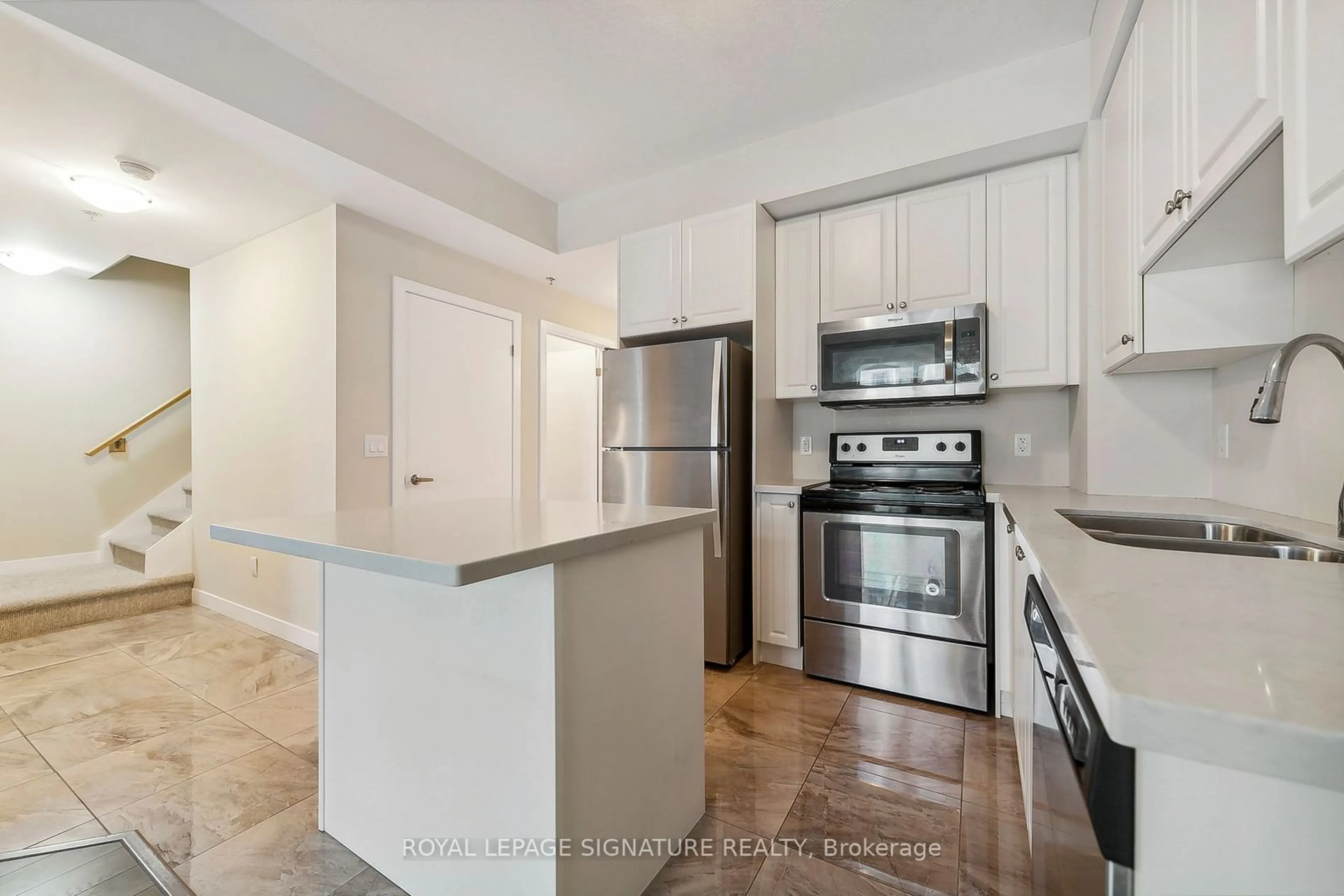 Standard kitchen, wood floors, the street view for 2486 Old Bronte Rd #333, Oakville Ontario L6M 4J2