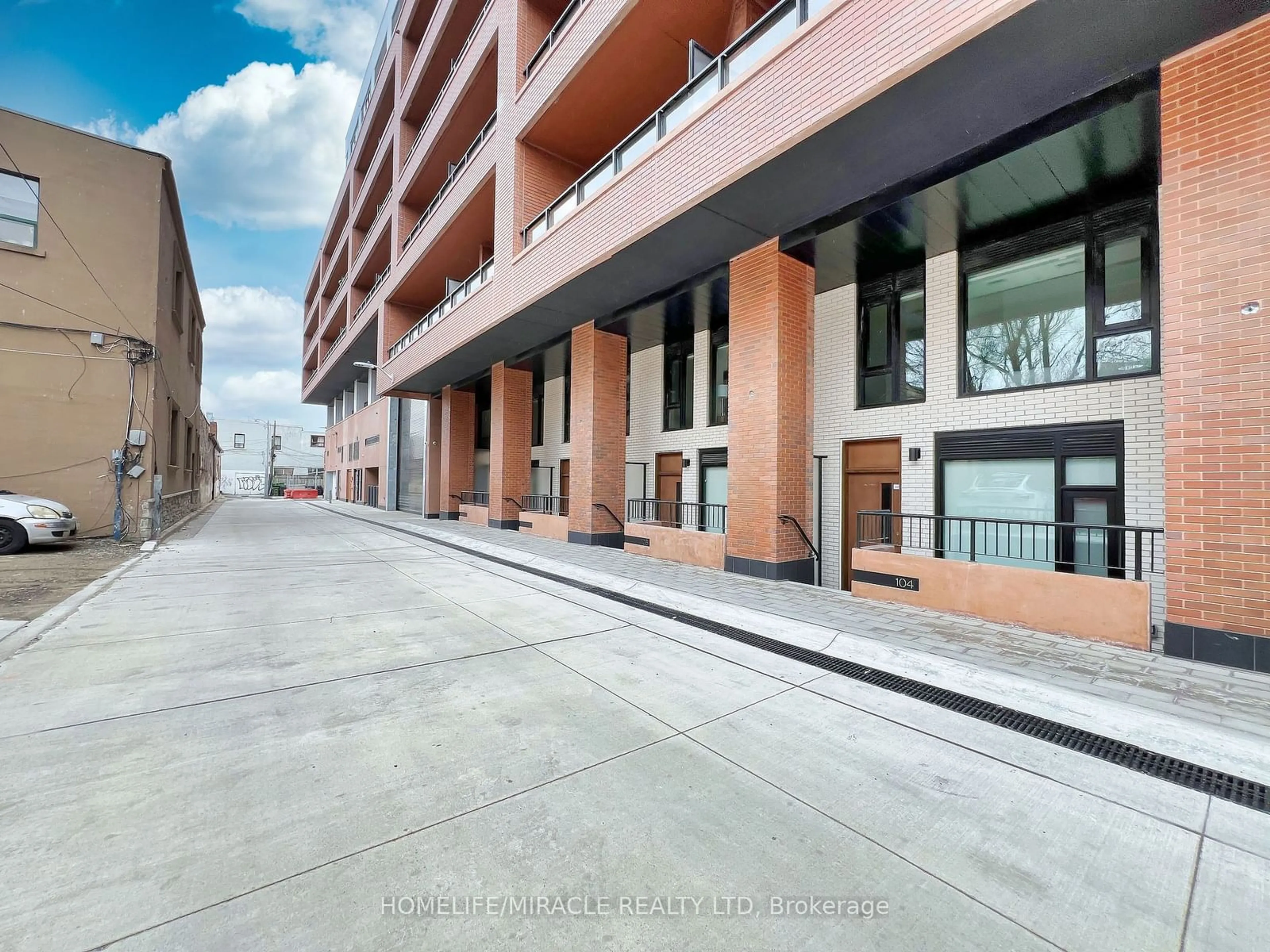 A pic from exterior of the house or condo, the street view for 7 Watkinson Ave #105, Toronto Ontario M6P 1Y2