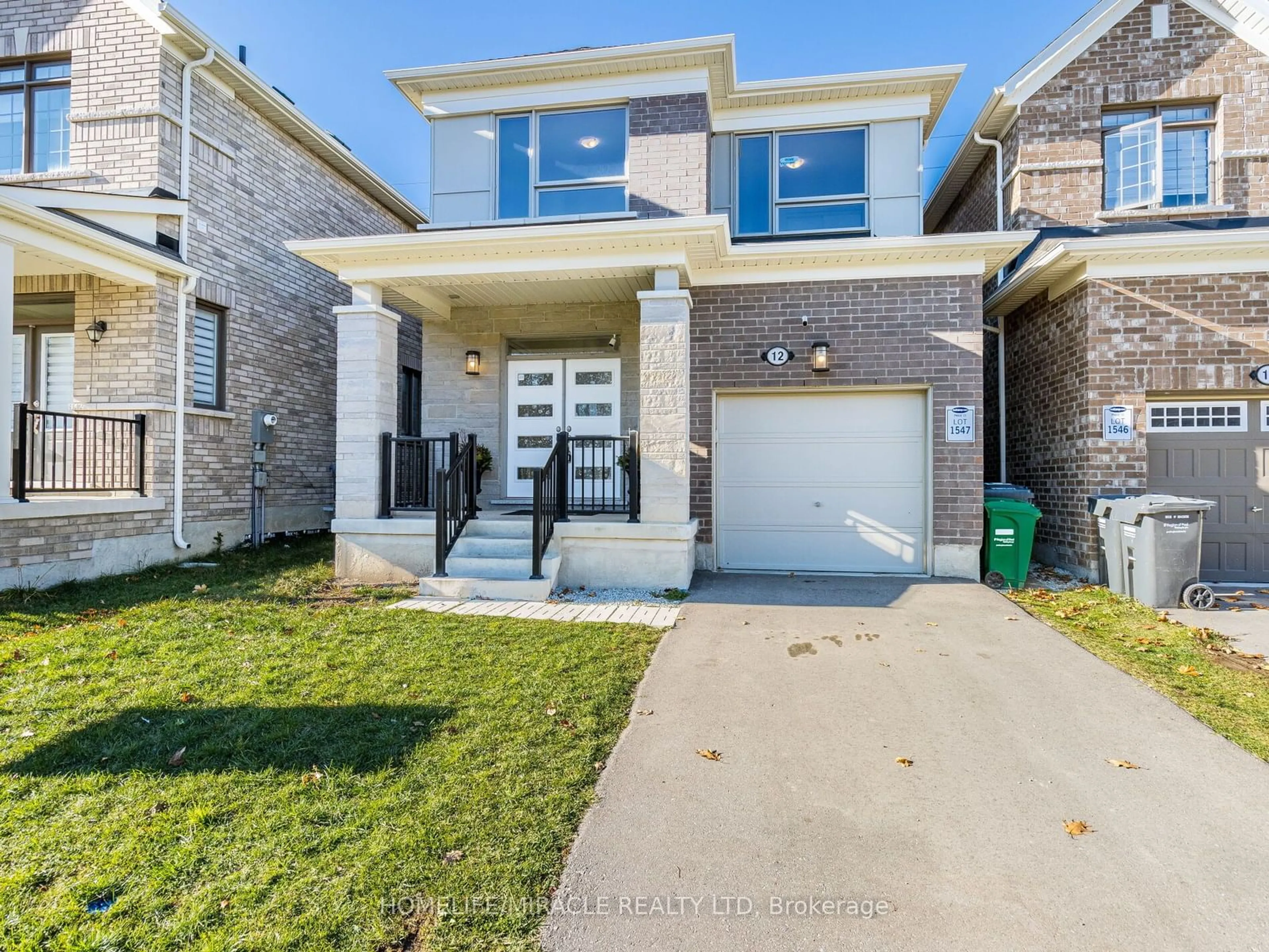 Home with brick exterior material for 12 Callahan Crt, Brampton Ontario L7A 5H3