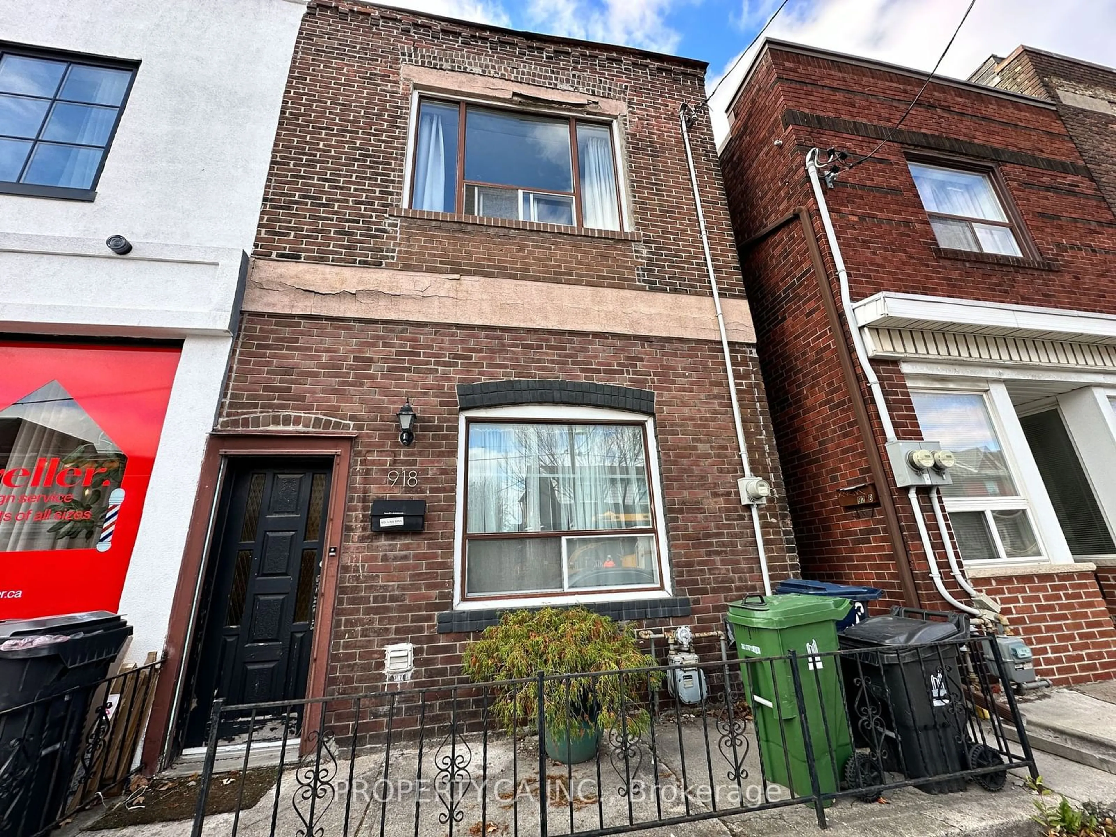A pic from exterior of the house or condo, the street view for 918 Ossington Ave, Toronto Ontario M6G 3V1