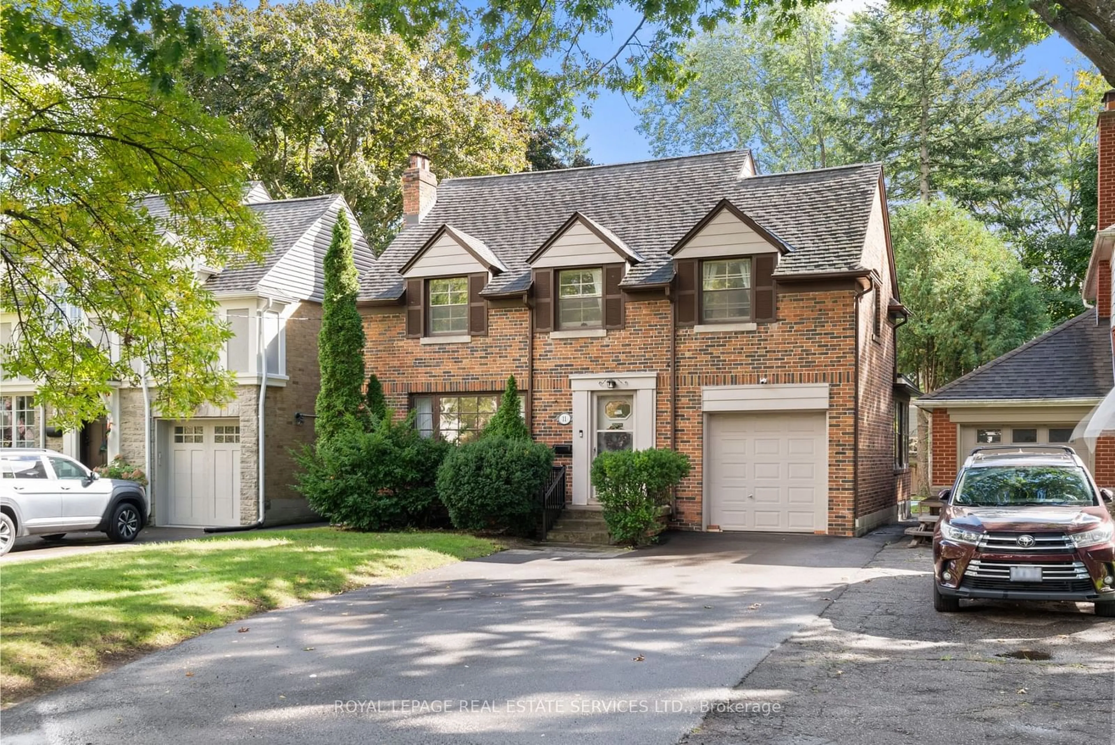 Home with brick exterior material for 11 Ashton Manr, Toronto Ontario M8Y 2N6