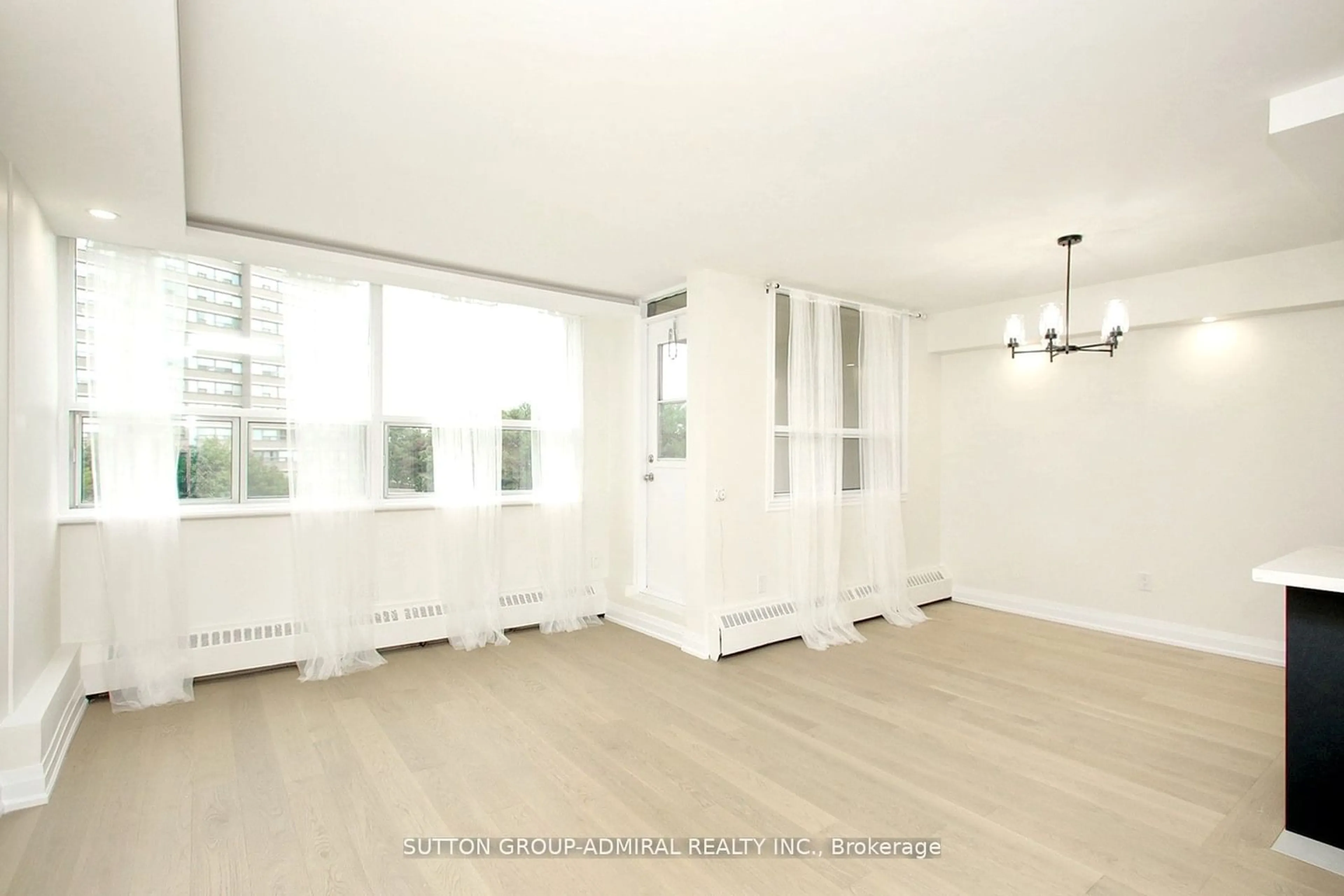 A pic of a room, wood floors for 451 The West Mall #321, Toronto Ontario M9C 1G1