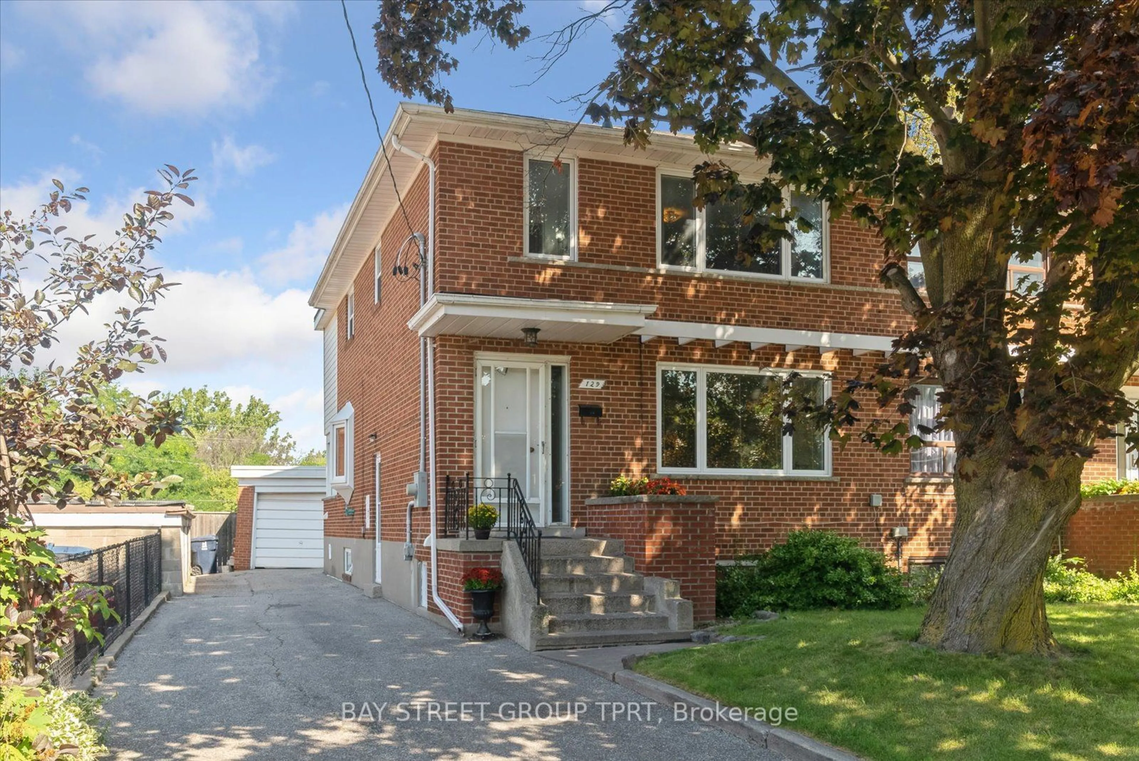 Home with brick exterior material for 129 Brookhaven Dr, Toronto Ontario M6M 4P1