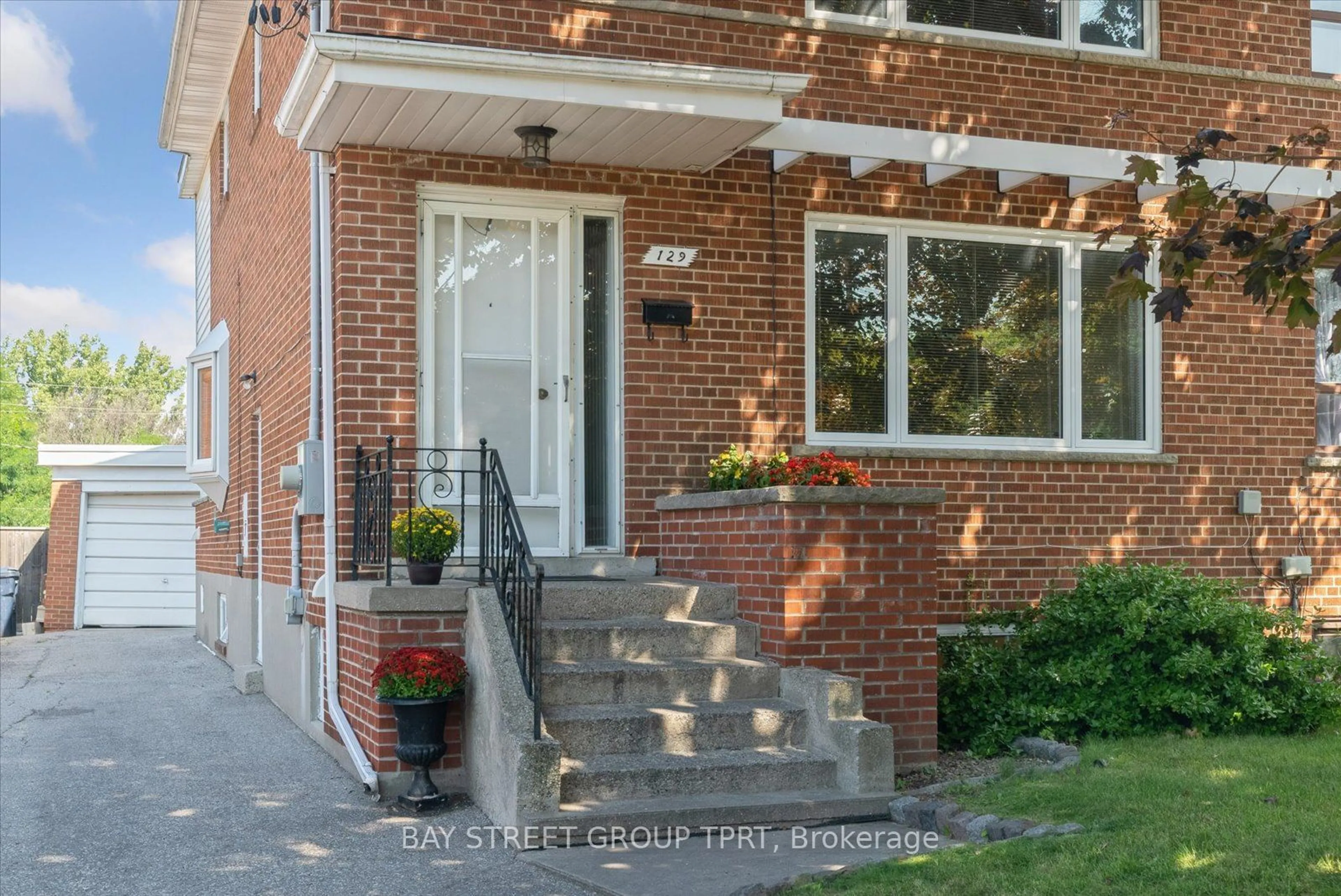 Home with brick exterior material for 129 Brookhaven Dr, Toronto Ontario M6M 4P1